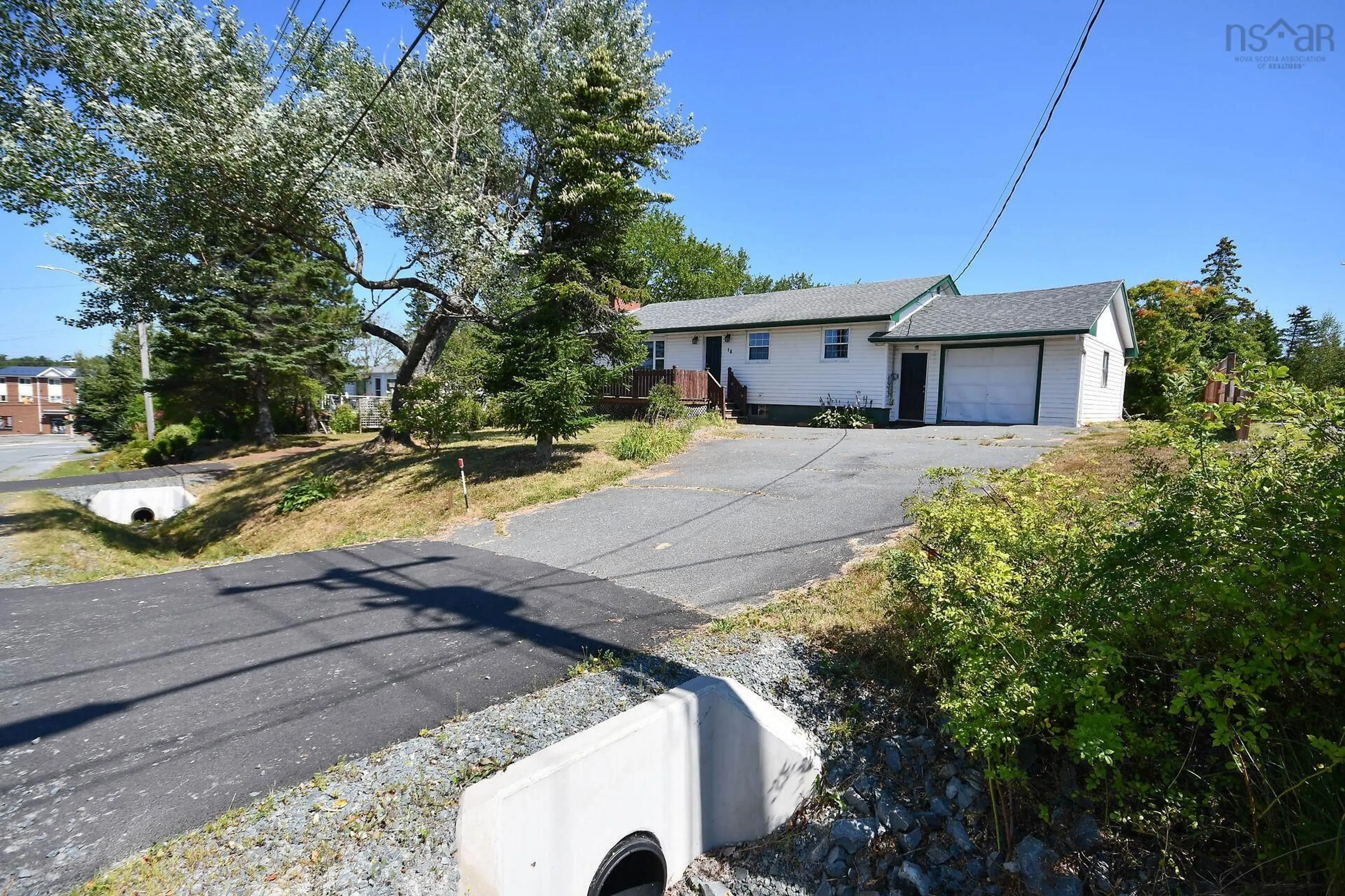 A pic from outside/outdoor area/front of a property/back of a property/a pic from drone, street for 18 Bissett Rd, Cole Harbour Nova Scotia B2V 2T1