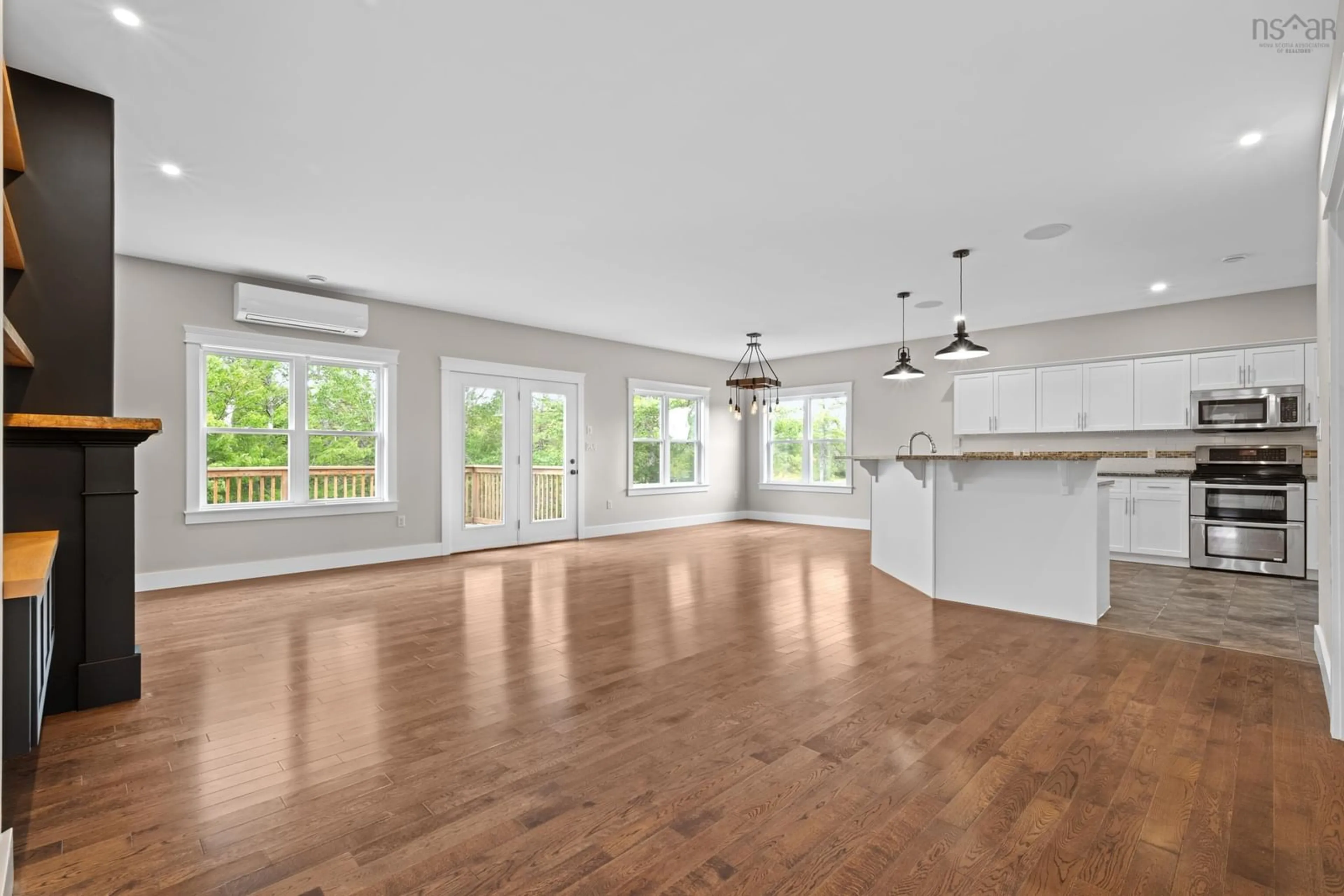 Open concept kitchen, wood/laminate floor for 531 Celebration Dr, Fall River Nova Scotia B2T 0K6