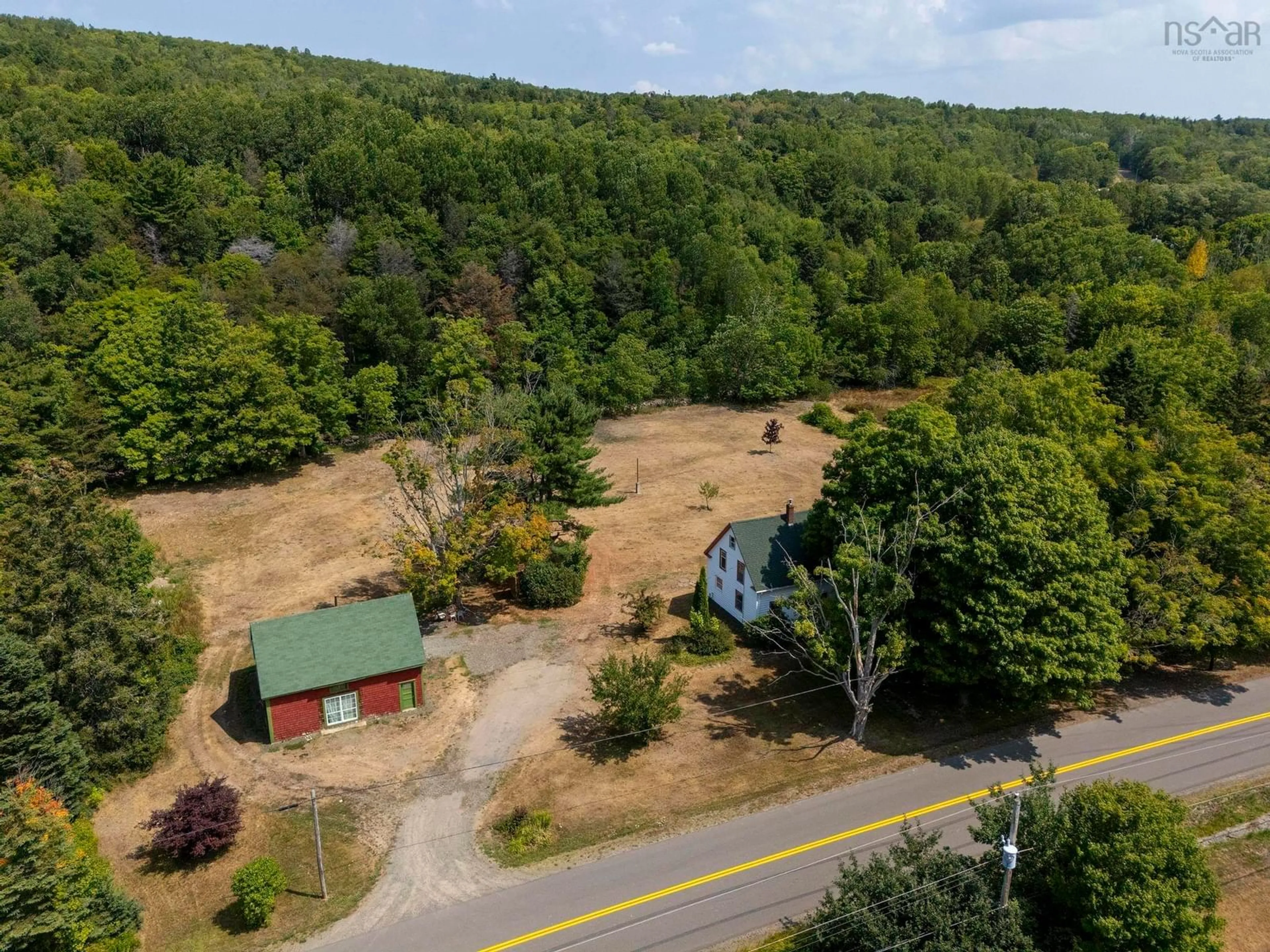 A pic from outside/outdoor area/front of a property/back of a property/a pic from drone, forest/trees view for 213 Clementsport Rd, Clementsport Nova Scotia B0S 1E0