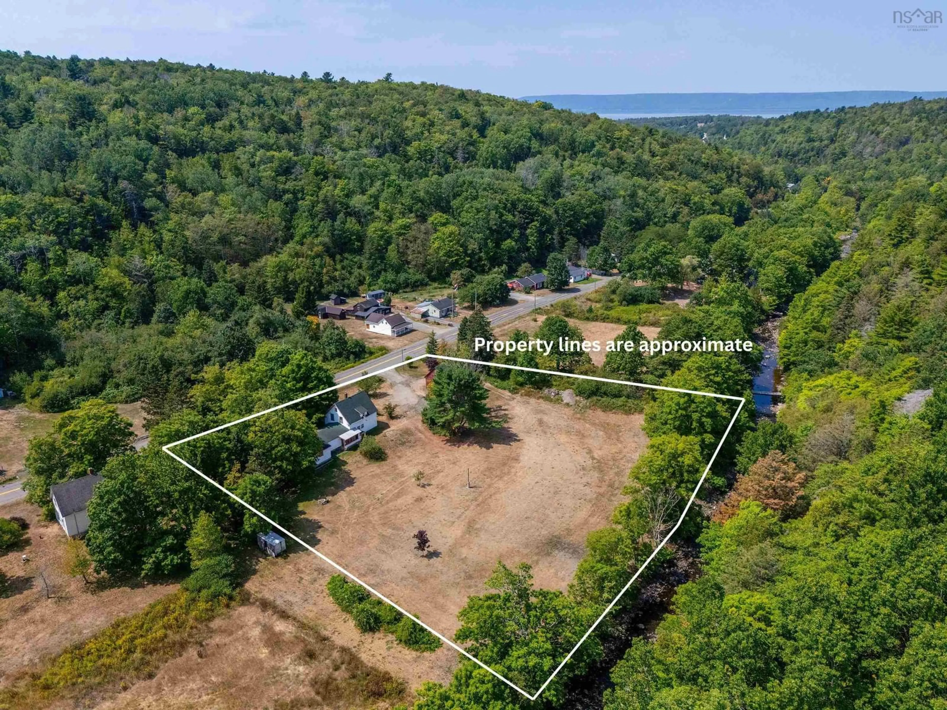 A pic from outside/outdoor area/front of a property/back of a property/a pic from drone, unknown for 213 Clementsport Rd, Clementsport Nova Scotia B0S 1E0