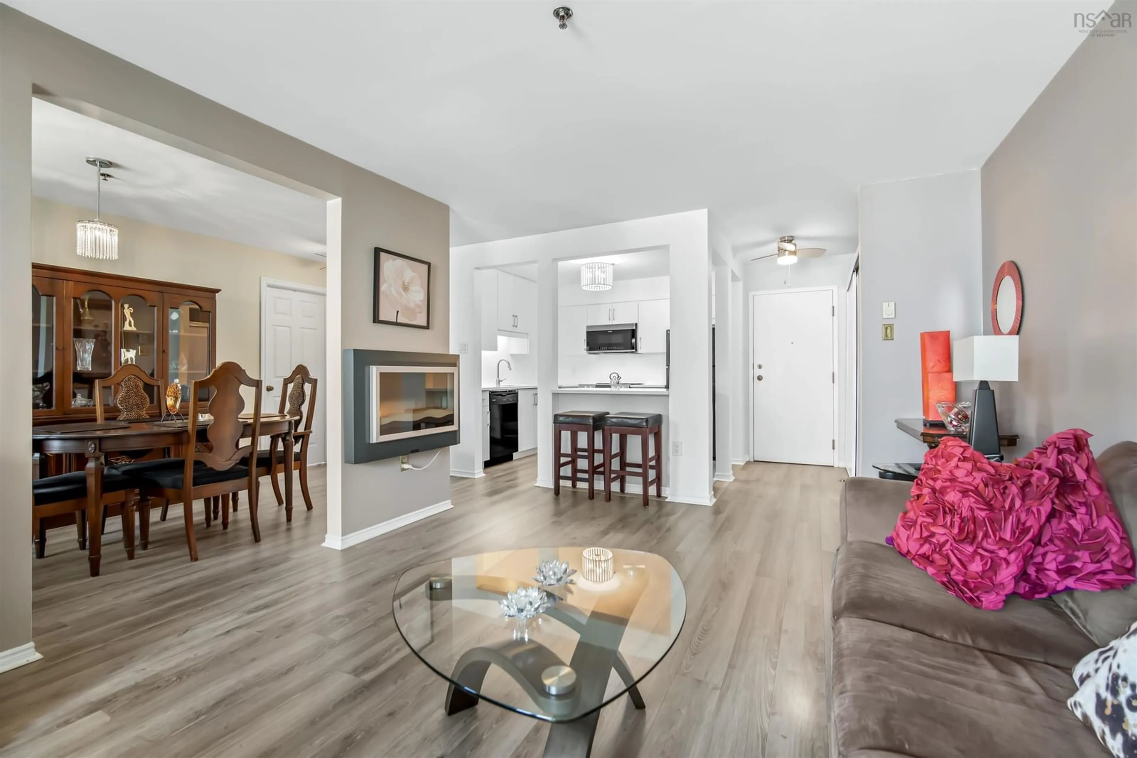 Living room with furniture, wood/laminate floor for 87 Kearney Lake Road #309, Halifax Nova Scotia B3M 4H1