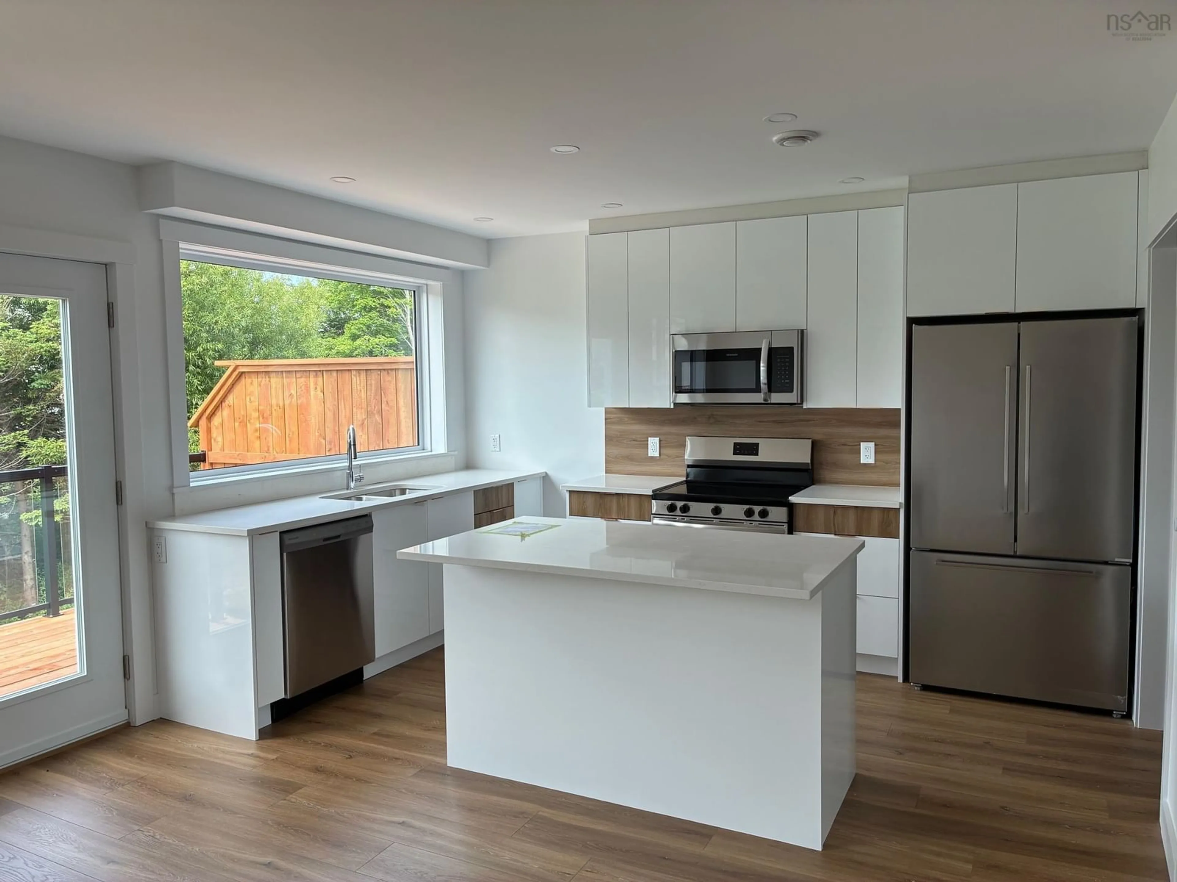 Open concept kitchen, unknown for 43 Berm St, Herring Cove Nova Scotia B3R 0H2