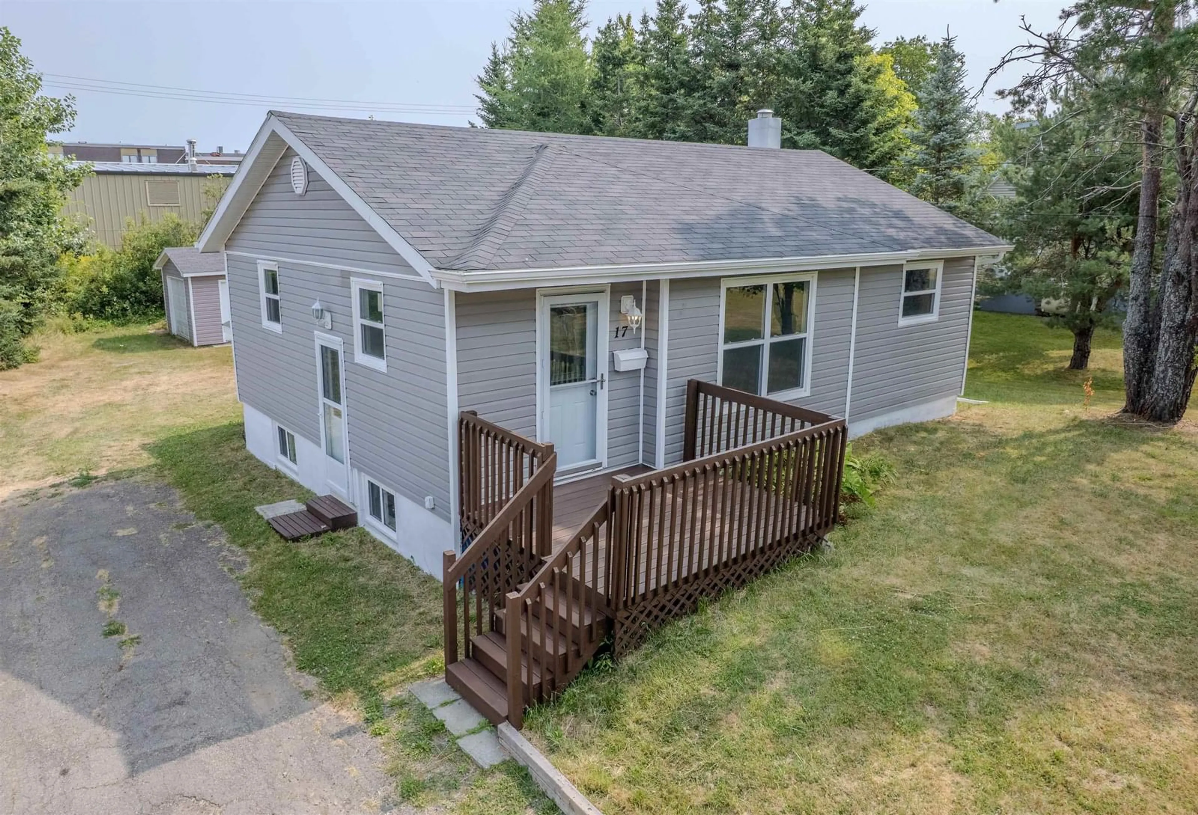 A pic from outside/outdoor area/front of a property/back of a property/a pic from drone, street for 17 Hillcrest Dr, Coxheath Nova Scotia B1R 1V1