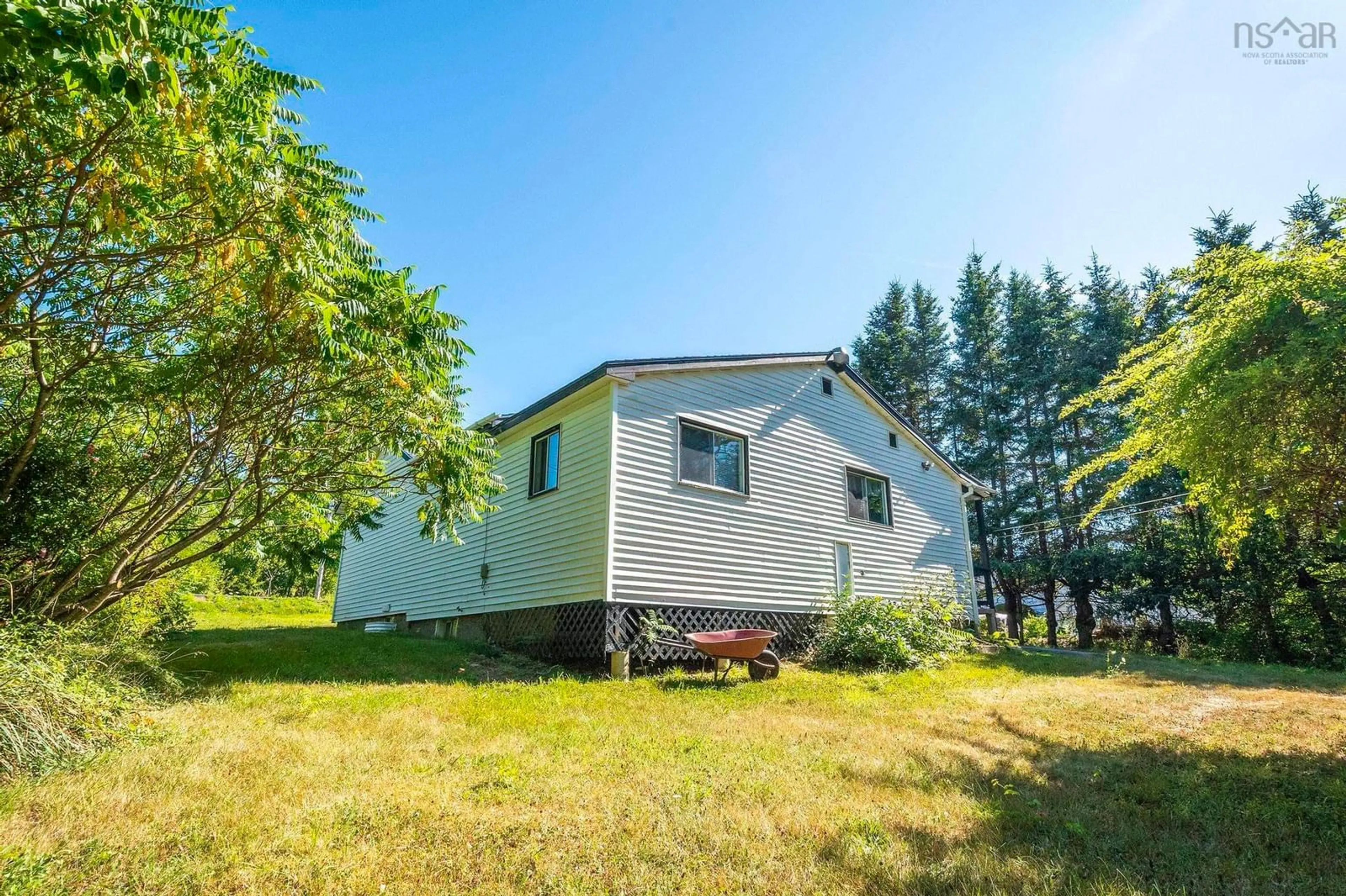 Home with vinyl exterior material, water/lake/river/ocean view for 925 1 Hwy, Deep Brook Nova Scotia B0S 1J0