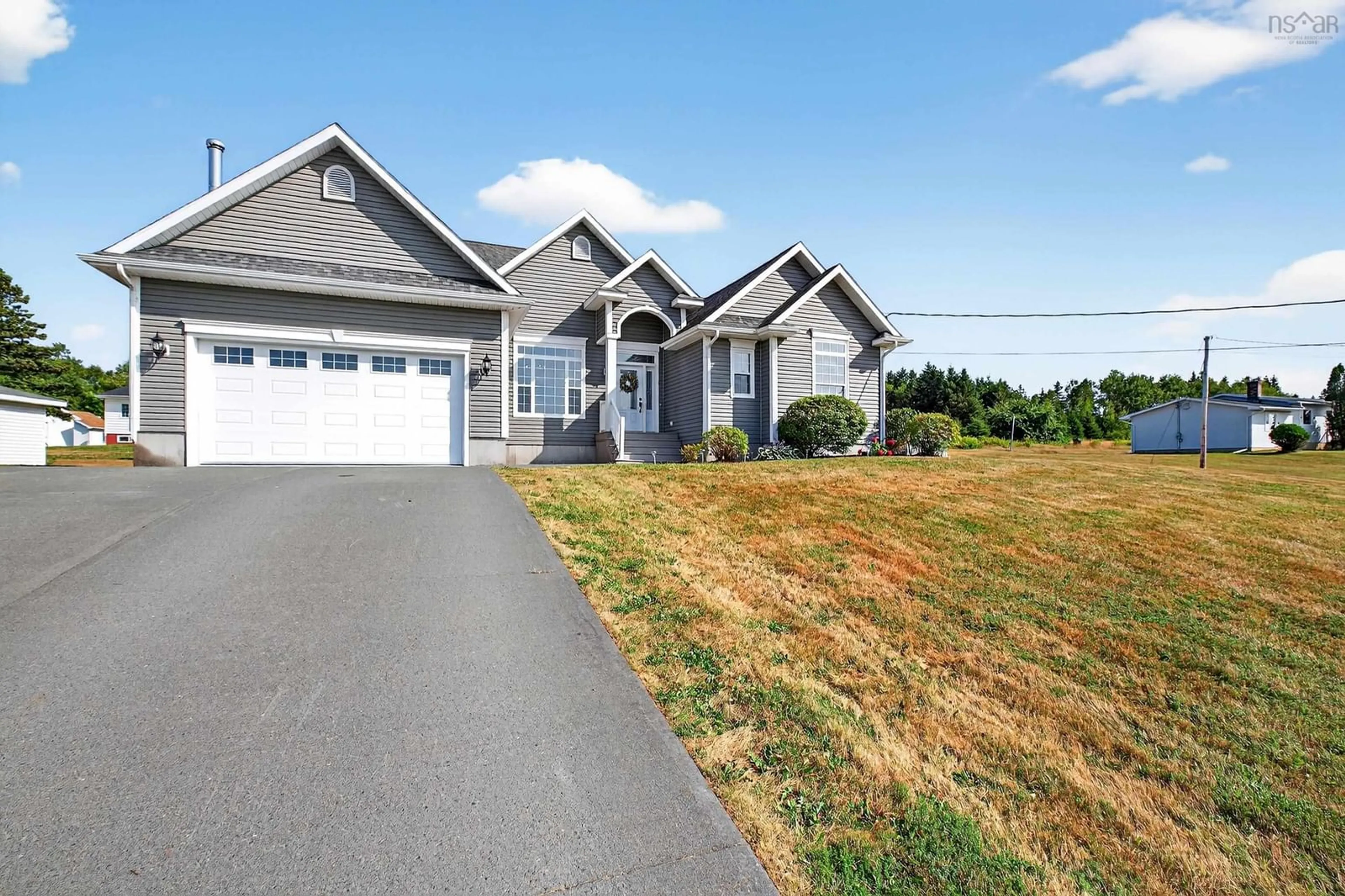 Home with vinyl exterior material, street for 22 Helens Avenue, Georges River Nova Scotia B1Y 3G4