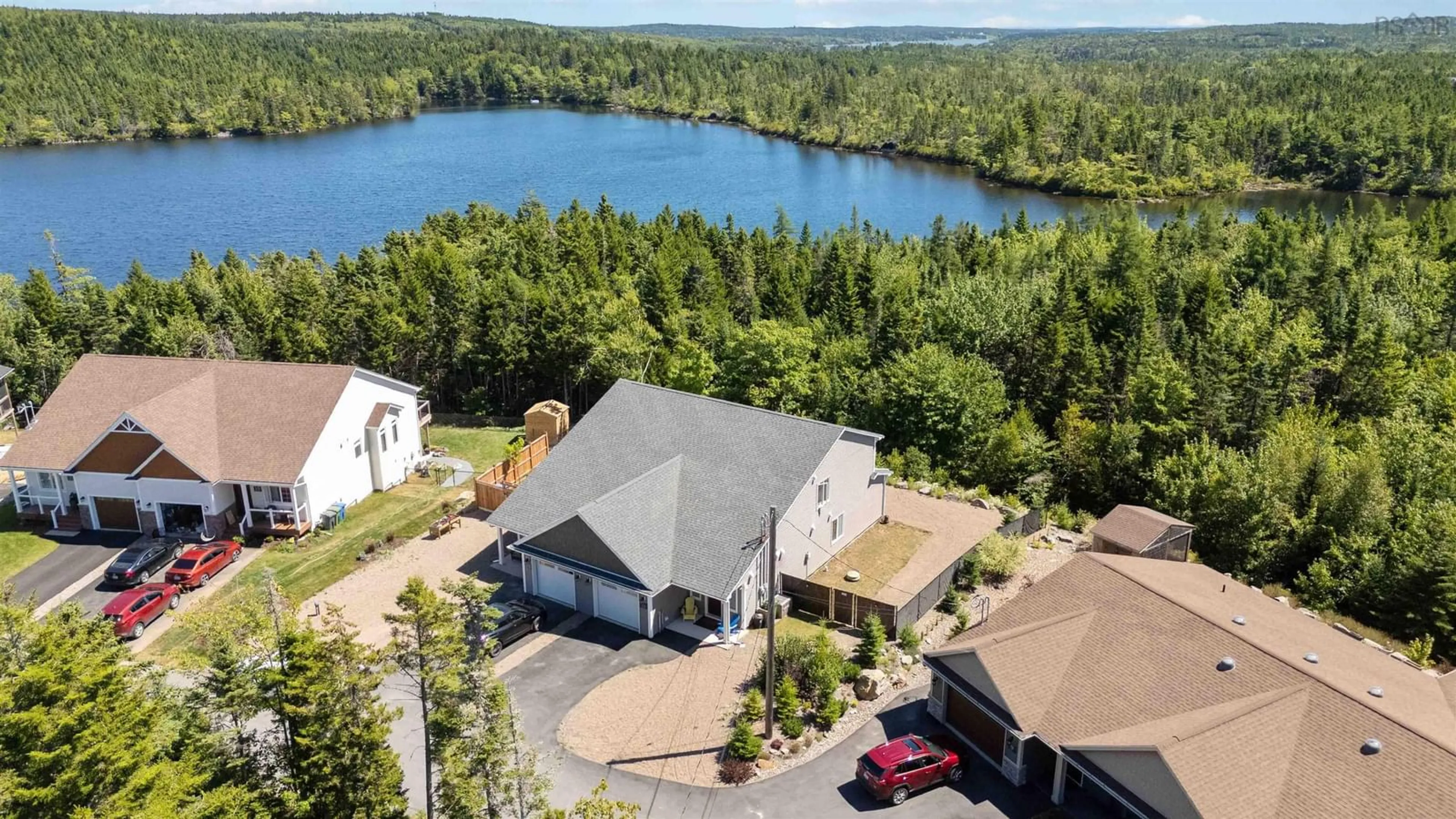 A pic from outside/outdoor area/front of a property/back of a property/a pic from drone, water/lake/river/ocean view for 11 Peaceful Pl, Porters Lake Nova Scotia B3E 0E6