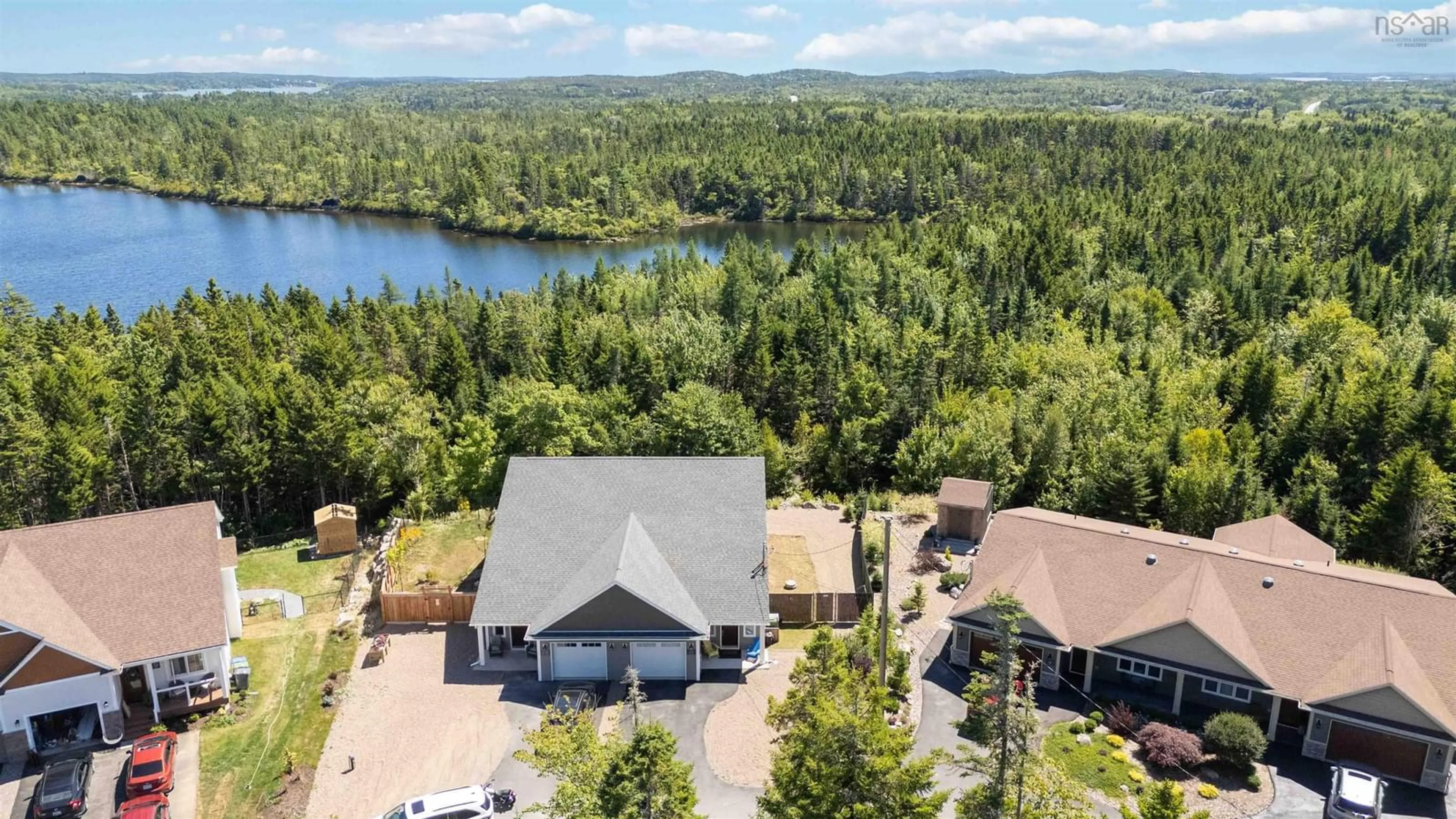 A pic from outside/outdoor area/front of a property/back of a property/a pic from drone, water/lake/river/ocean view for 11 Peaceful Pl, Porters Lake Nova Scotia B3E 0E6