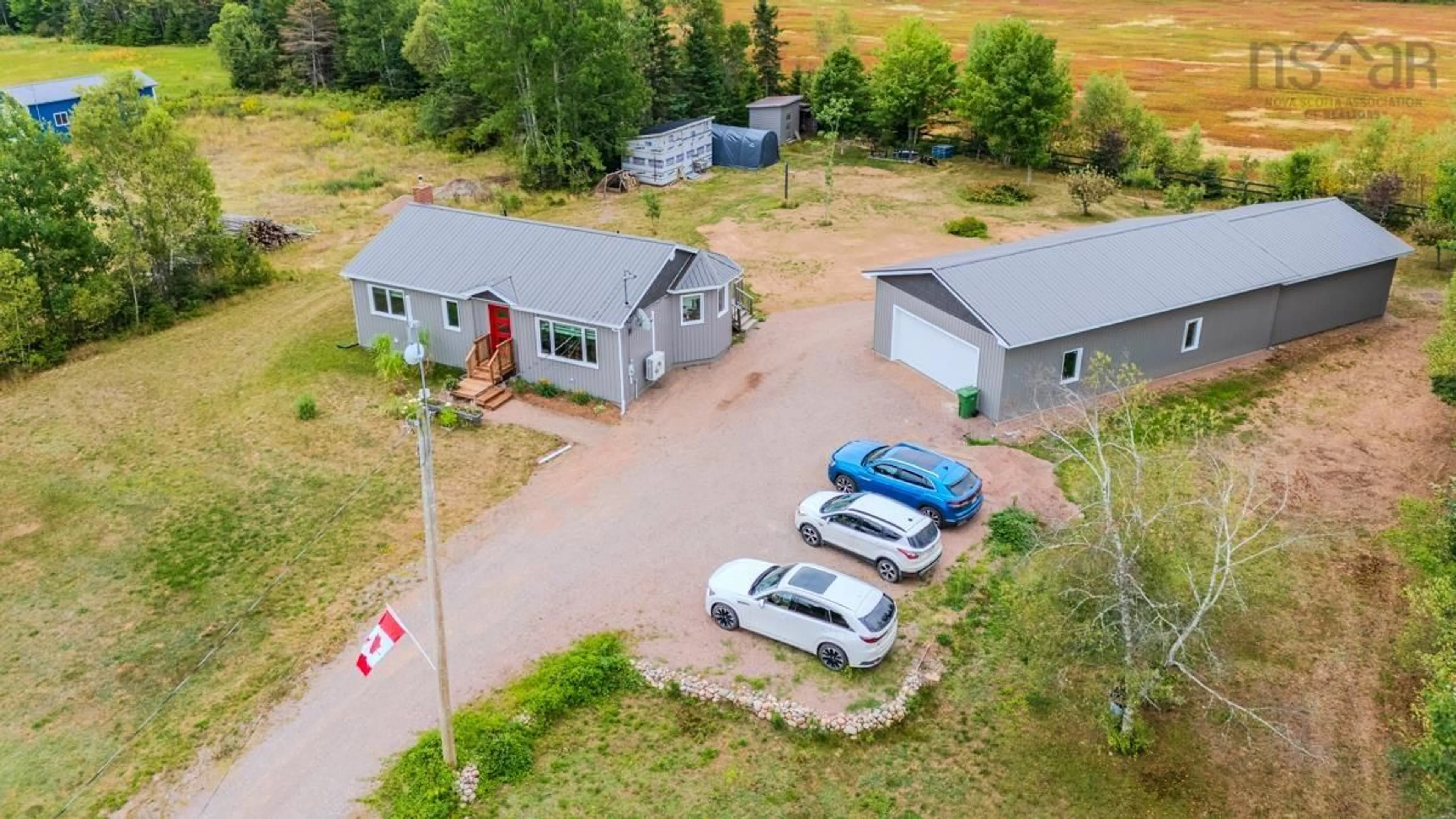 A pic from outside/outdoor area/front of a property/back of a property/a pic from drone, street for 7048 Hwy 2, Portapique Nova Scotia B0M 1B0