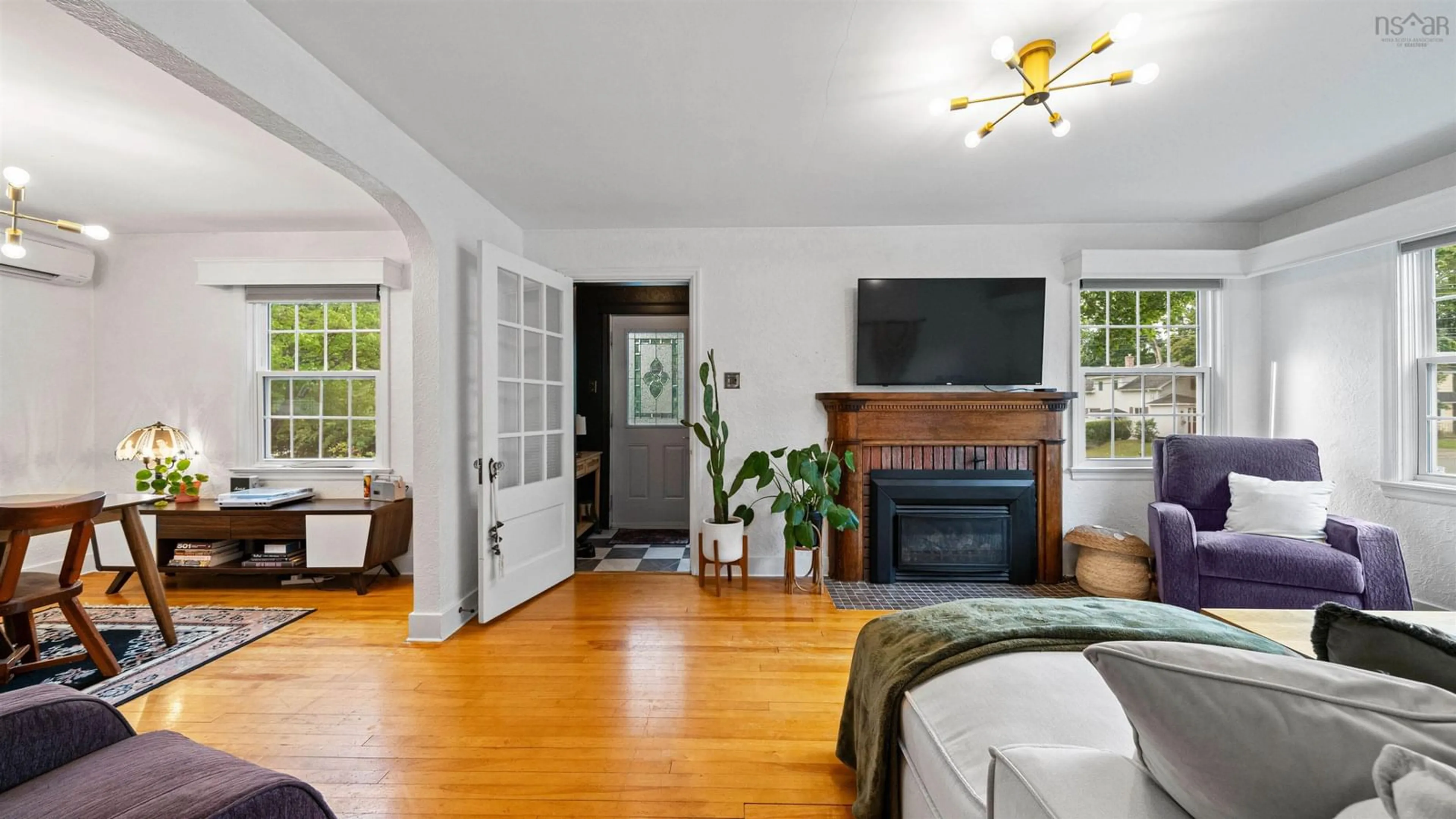 Living room with furniture, wood/laminate floor for 110 Elm St, New Glasgow Nova Scotia B2H 1Y4