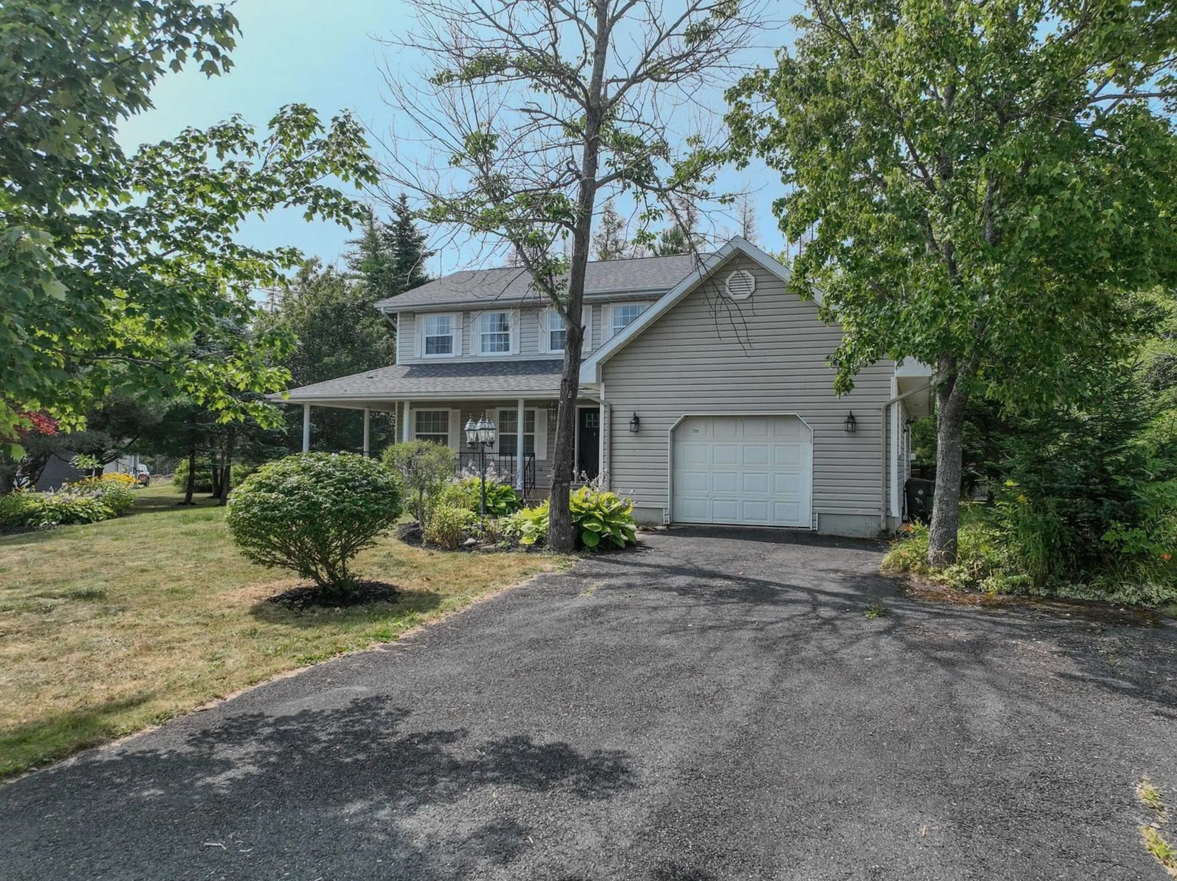 A pic from outside/outdoor area/front of a property/back of a property/a pic from drone, street for 36 Amberwood Cres, Westmount Nova Scotia B1R 2J8