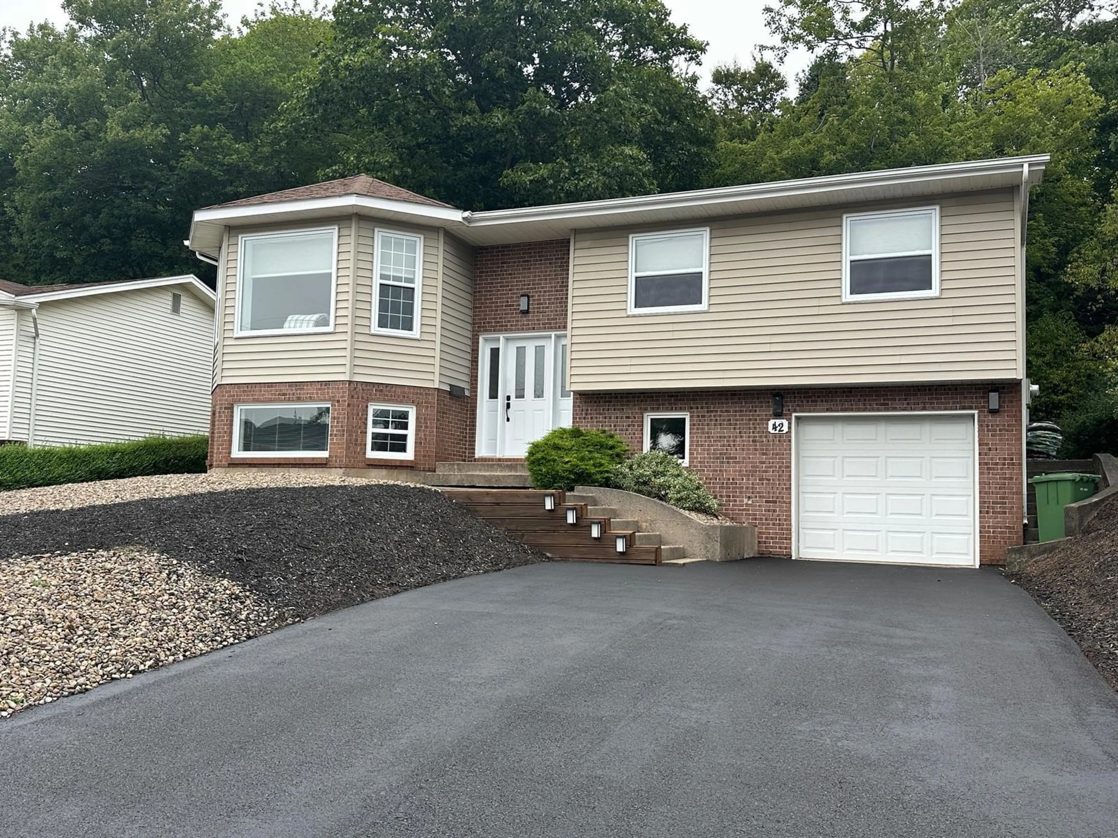 Home with vinyl exterior material, street for 42 P Thomas Dr, Dartmouth Nova Scotia B2W 6A1