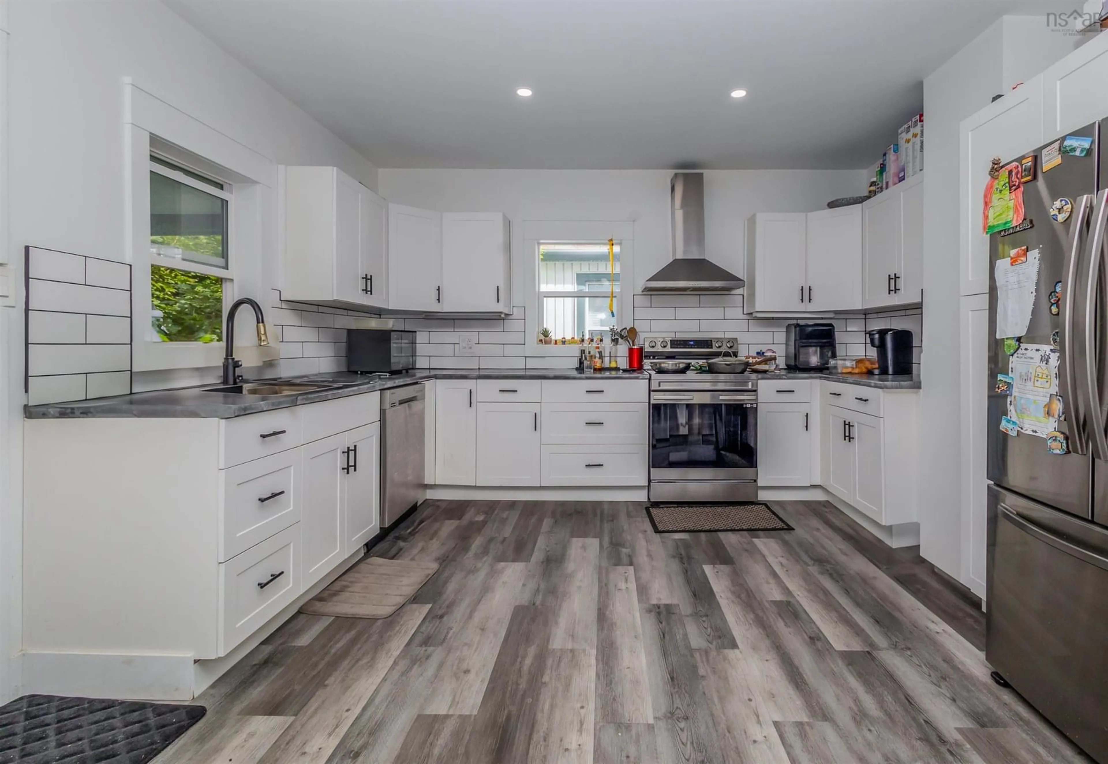 Open concept kitchen, unknown for 443 Bentinck St, Sydney Nova Scotia B1S 2Y8