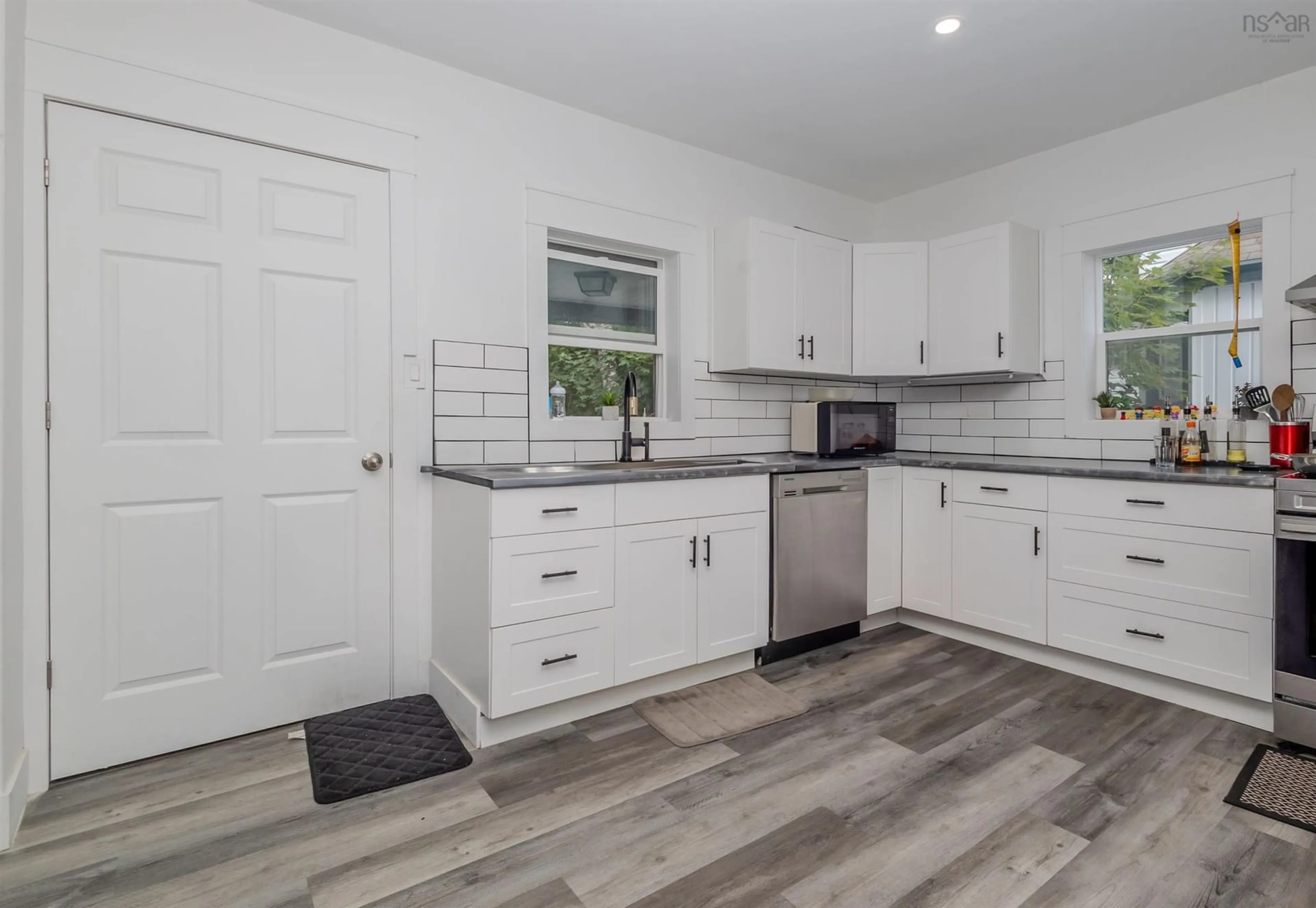 Open concept kitchen, ceramic/tile floor for 443 Bentinck St, Sydney Nova Scotia B1S 2Y8
