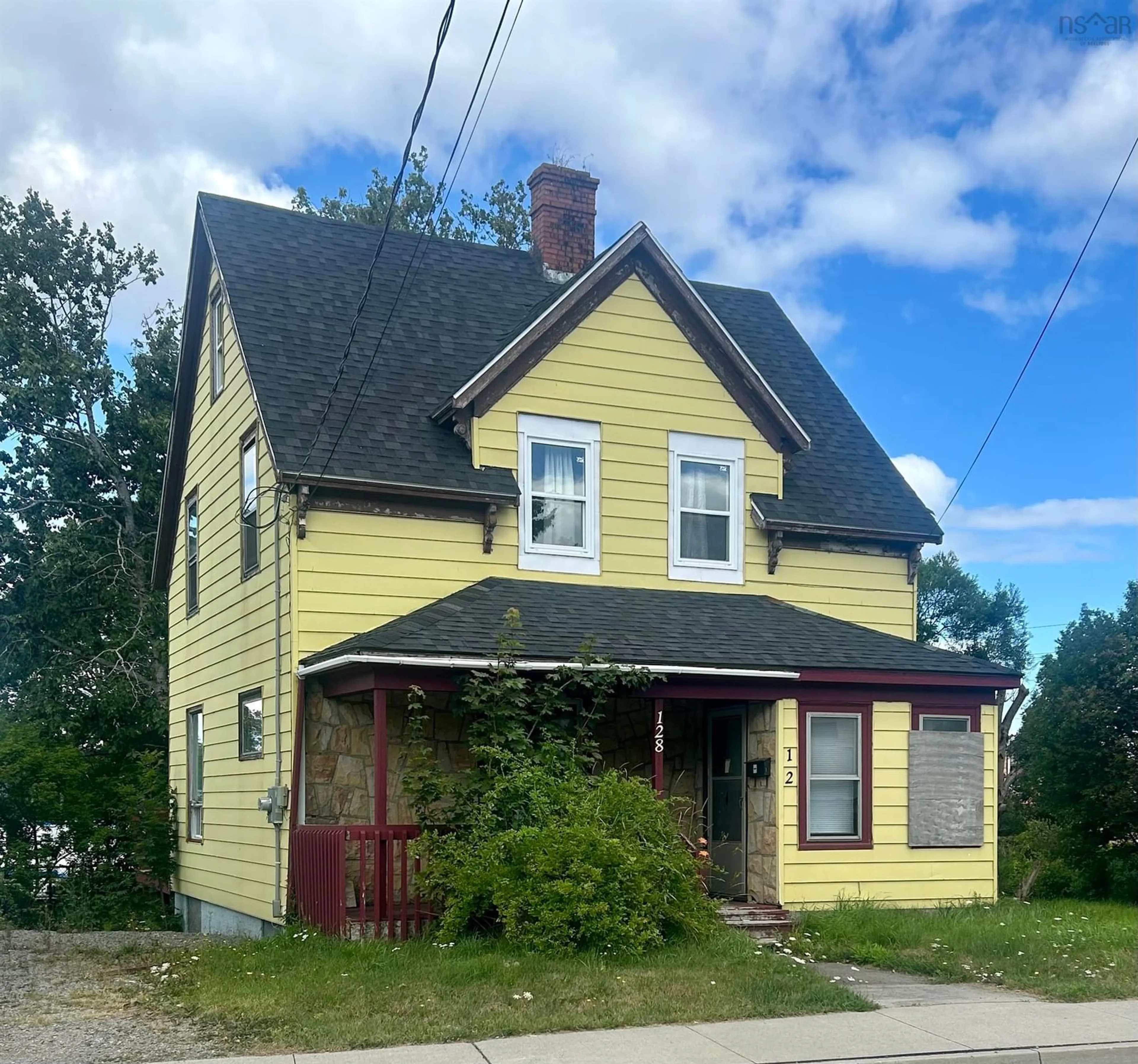 Home with vinyl exterior material, street for 128 Inglis St., Sydney Nova Scotia B1P 1W8