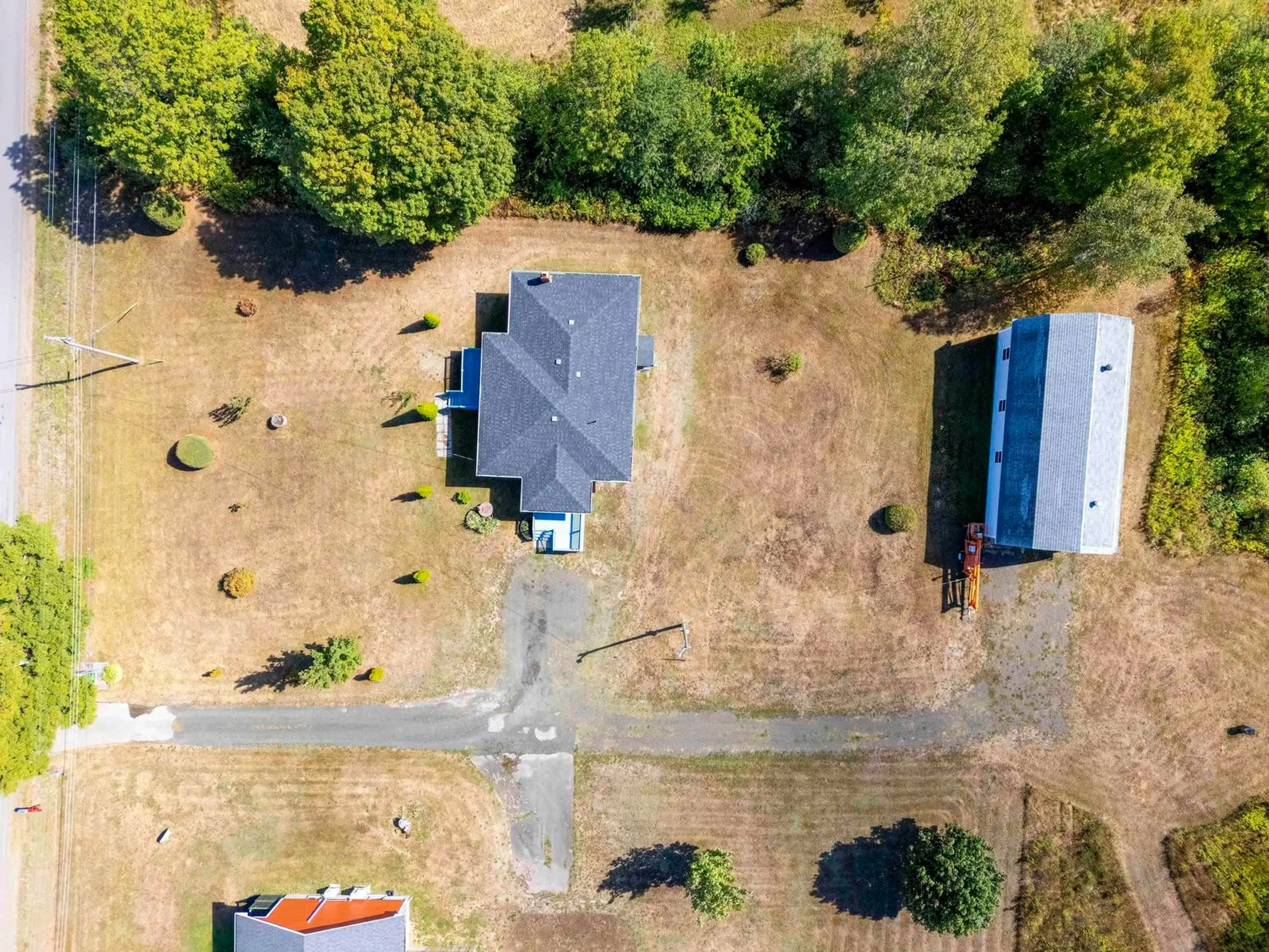 A pic from outside/outdoor area/front of a property/back of a property/a pic from drone, street for 1084 Ridge Rd, North Range Nova Scotia B0W 1H0