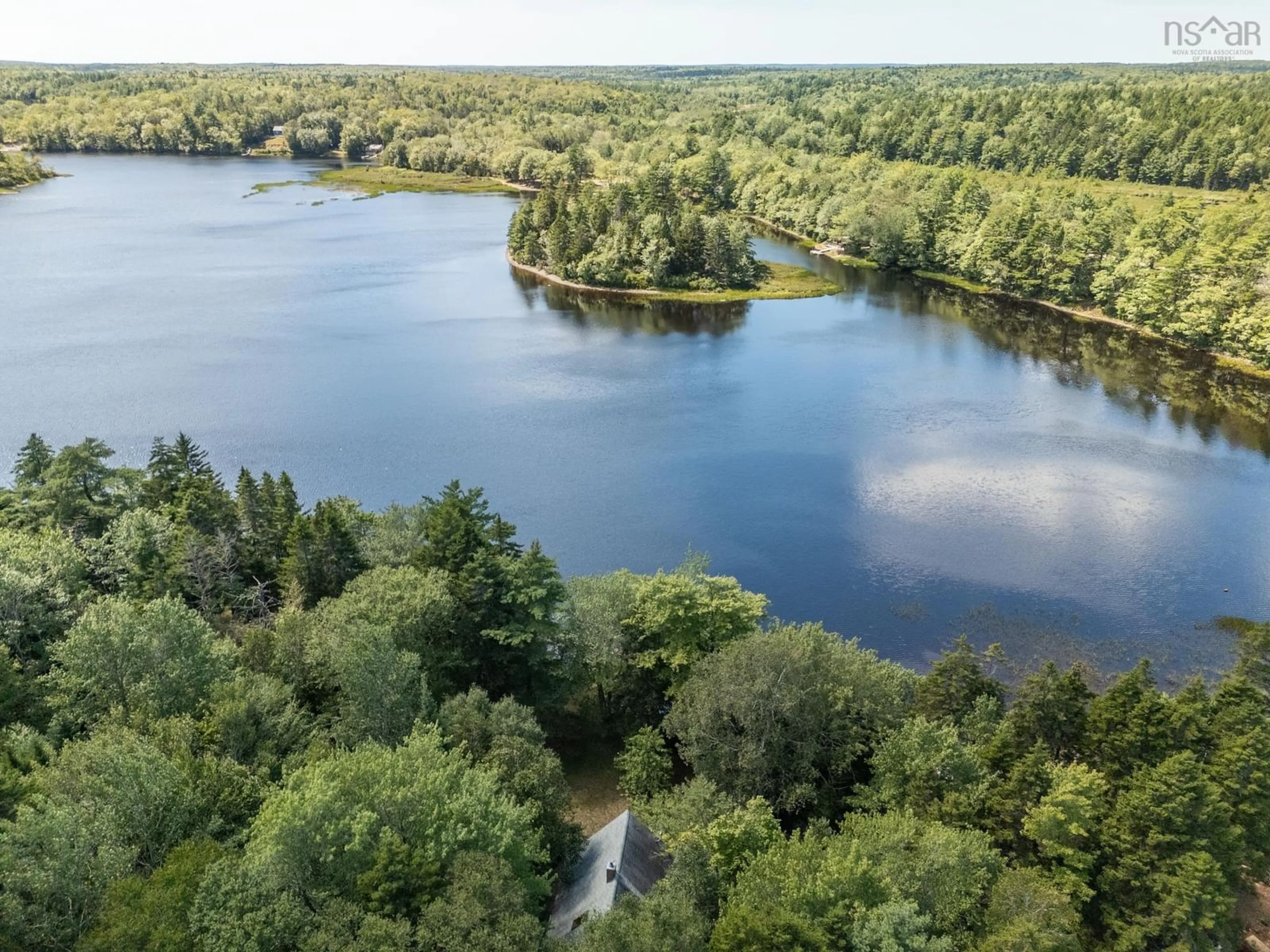 A pic from outside/outdoor area/front of a property/back of a property/a pic from drone, water/lake/river/ocean view for 102 Third Lake Point Rd, Briar Lake Nova Scotia B0W 2Y0