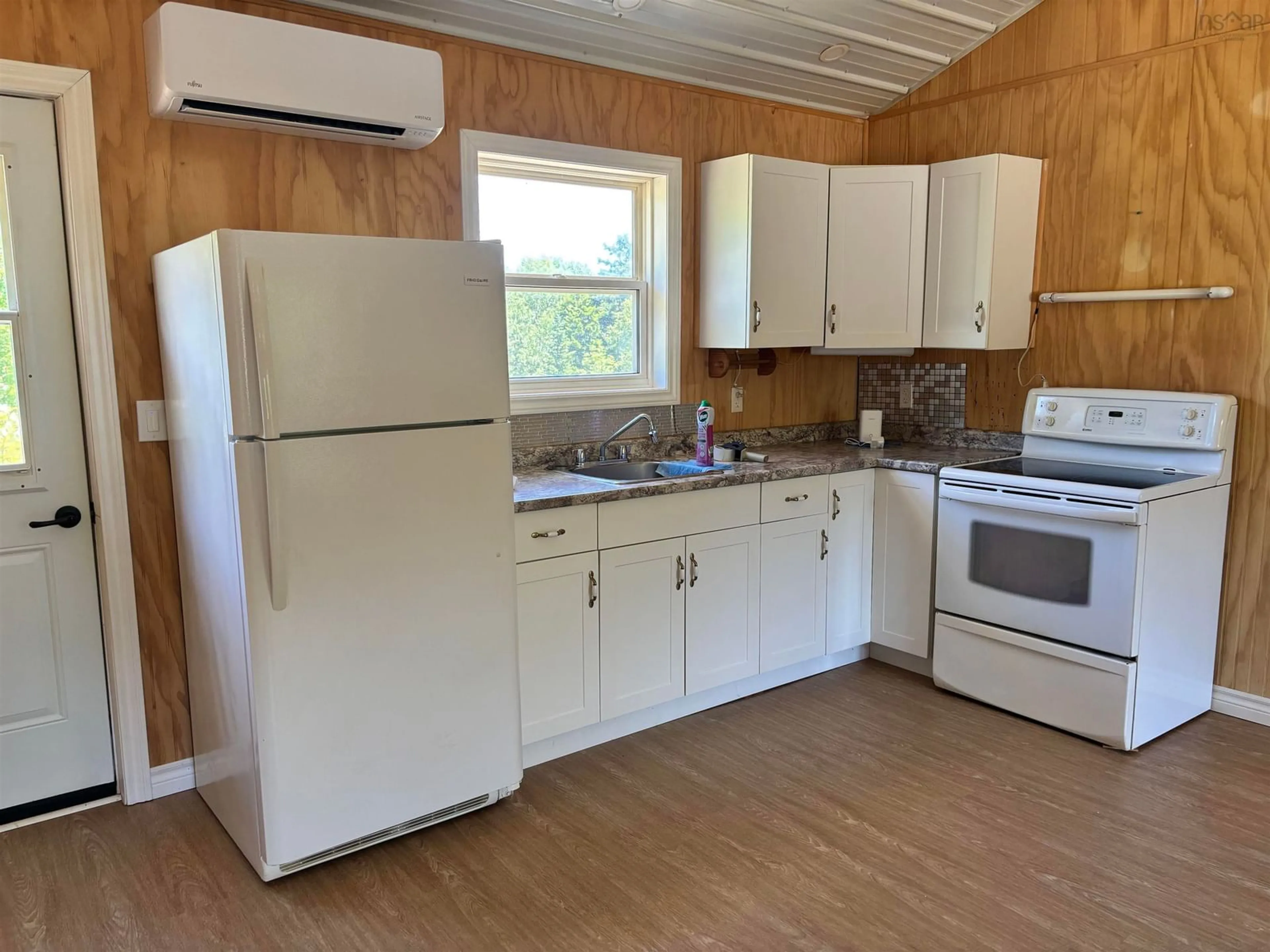 Standard kitchen, wood/laminate floor for 55 Pleasant St, Conway Nova Scotia B0V 1A0