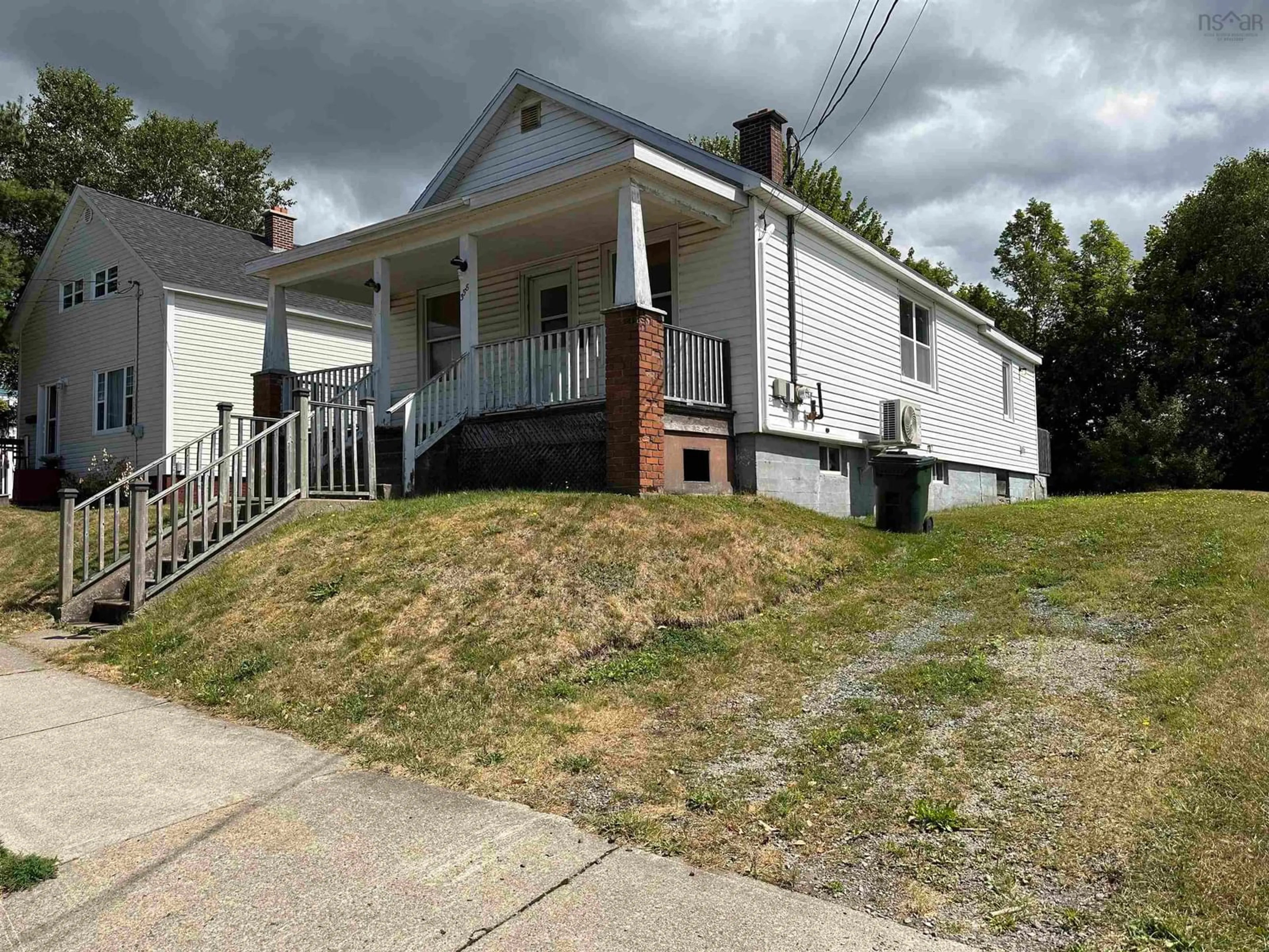 A pic from outside/outdoor area/front of a property/back of a property/a pic from drone, street for 358 Royal Ave, Sydney Nova Scotia B1P 4N5