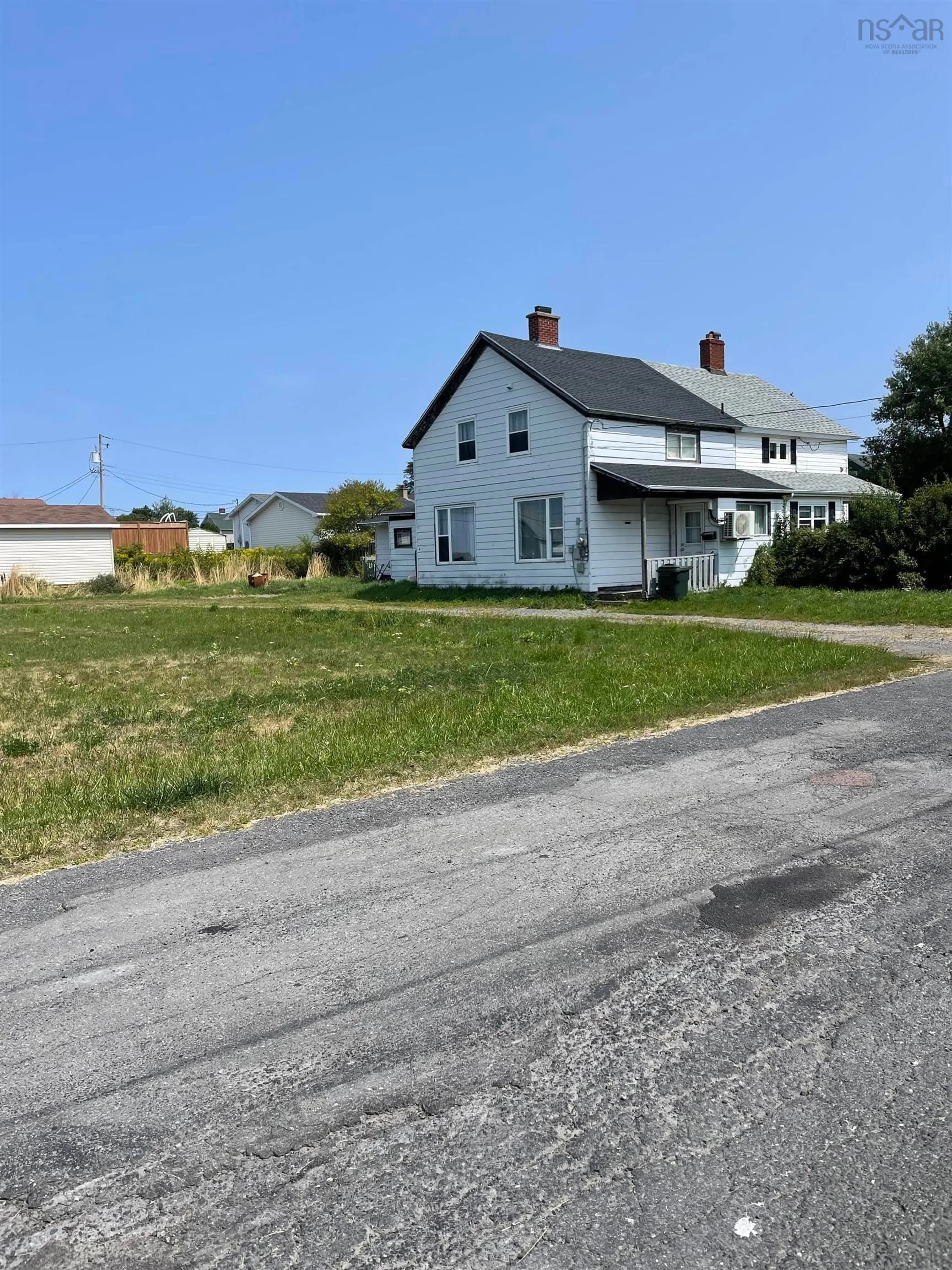 A pic from outside/outdoor area/front of a property/back of a property/a pic from drone, street for 3539 Duggan Ave, New Waterford Nova Scotia B1H 5B5