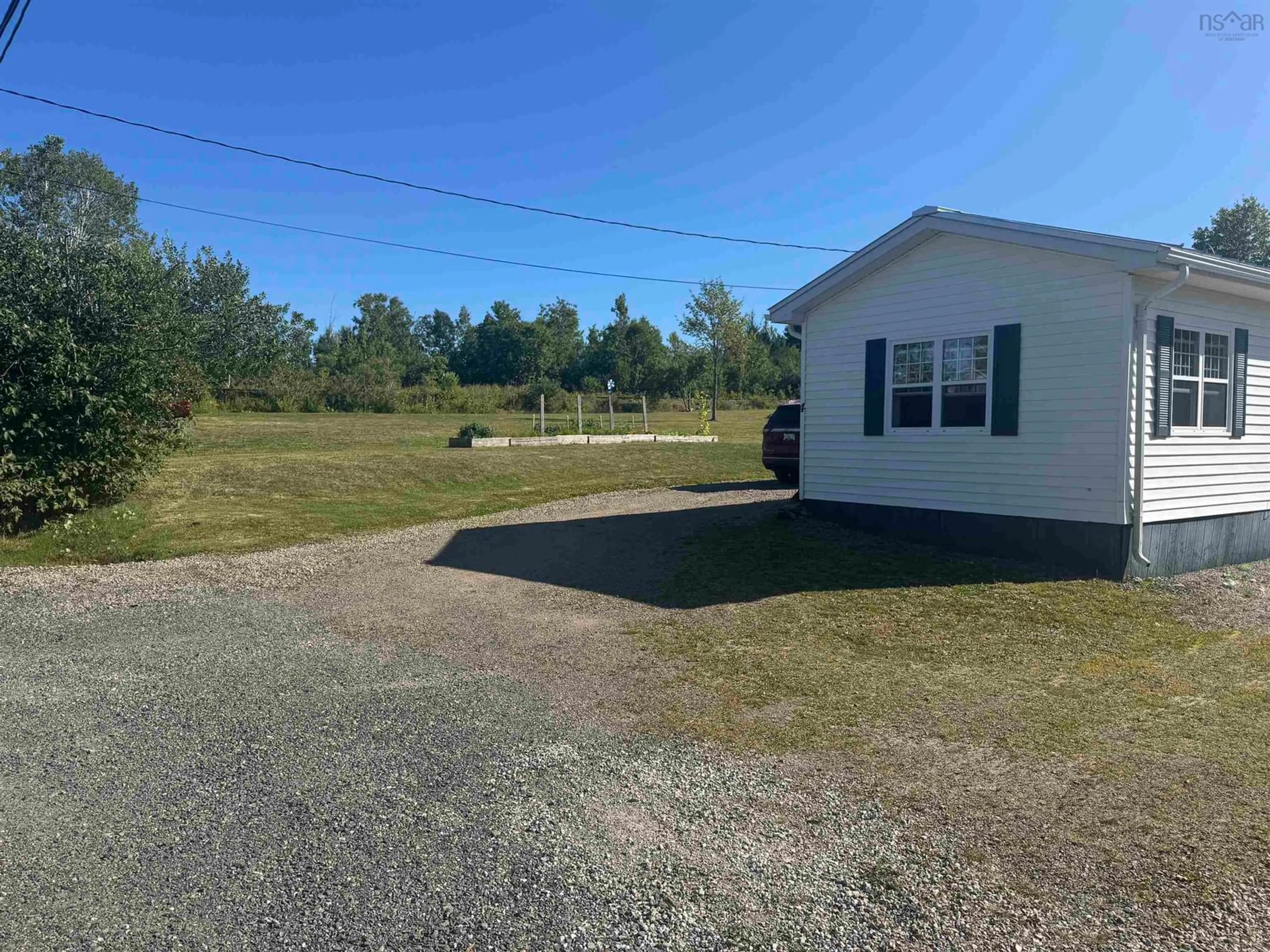 A pic from outside/outdoor area/front of a property/back of a property/a pic from drone, unknown for 4 Bushells Lane, North Sydney Nova Scotia B2A 3L6
