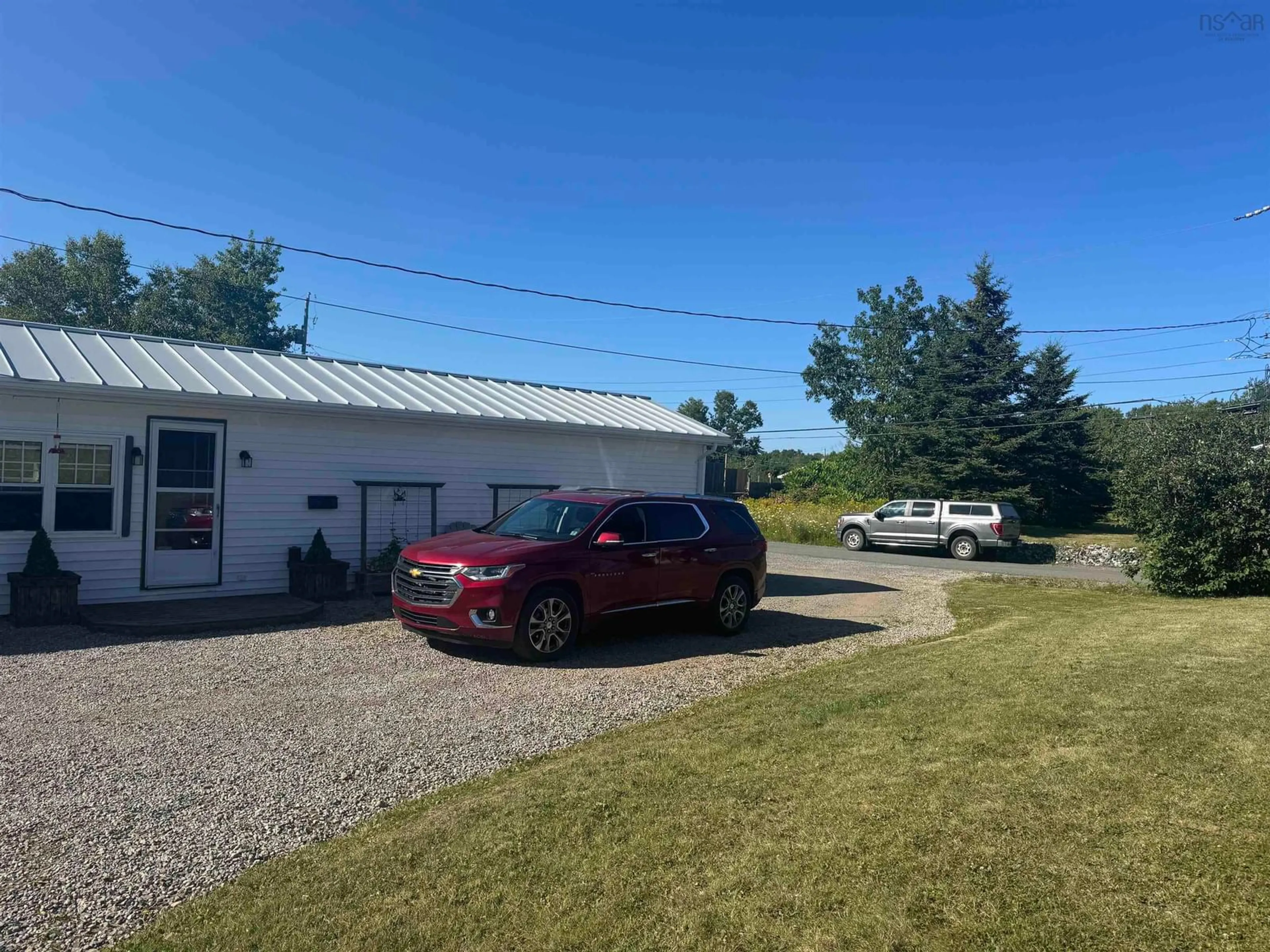 A pic from outside/outdoor area/front of a property/back of a property/a pic from drone, unknown for 4 Bushells Lane, North Sydney Nova Scotia B2A 3L6