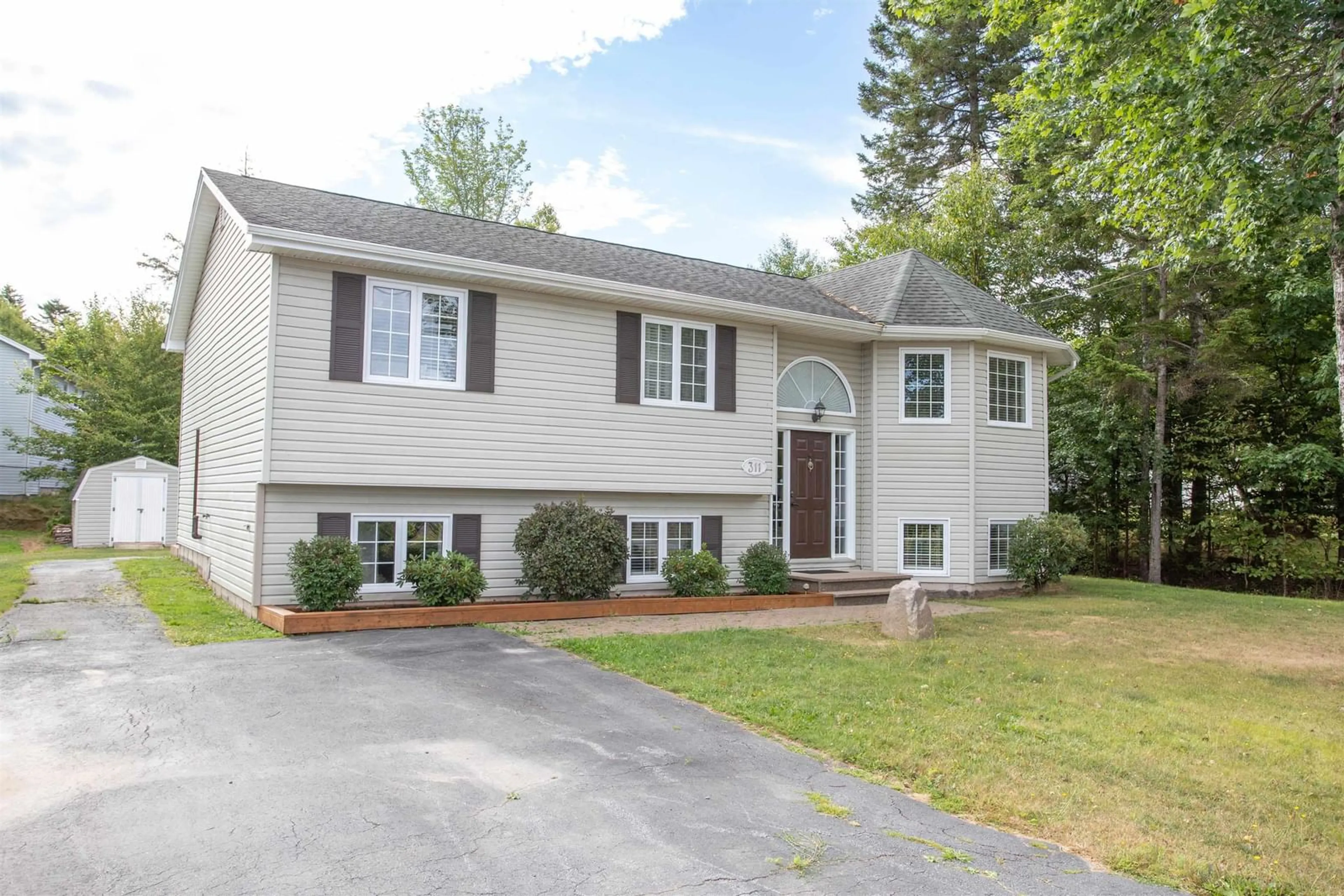 Home with vinyl exterior material, street for 311 Springfield Lake Road, Middle Sackville Nova Scotia B4E 3B1