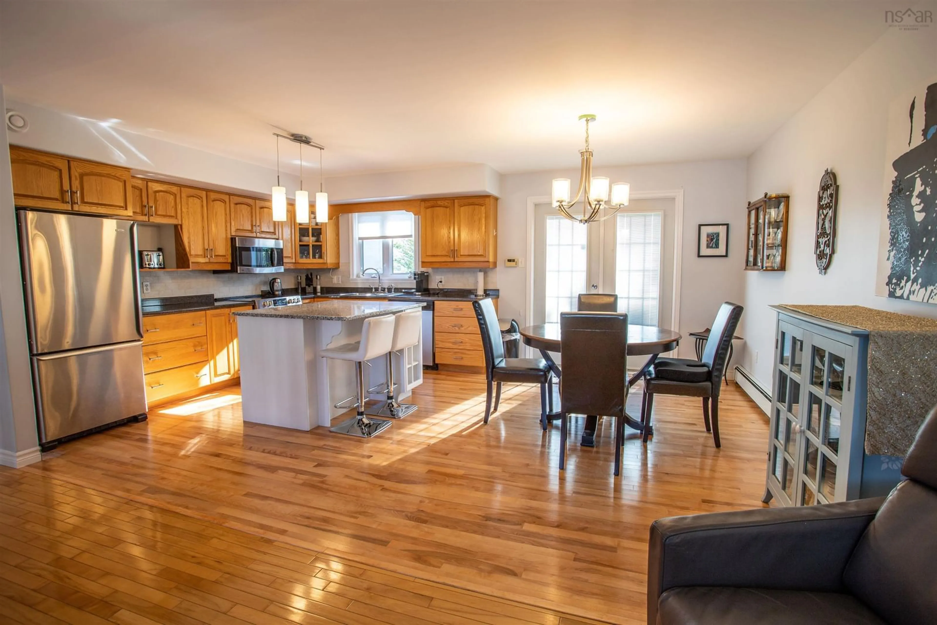 Open concept kitchen, wood/laminate floor for 311 Springfield Lake Road, Middle Sackville Nova Scotia B4E 3B1