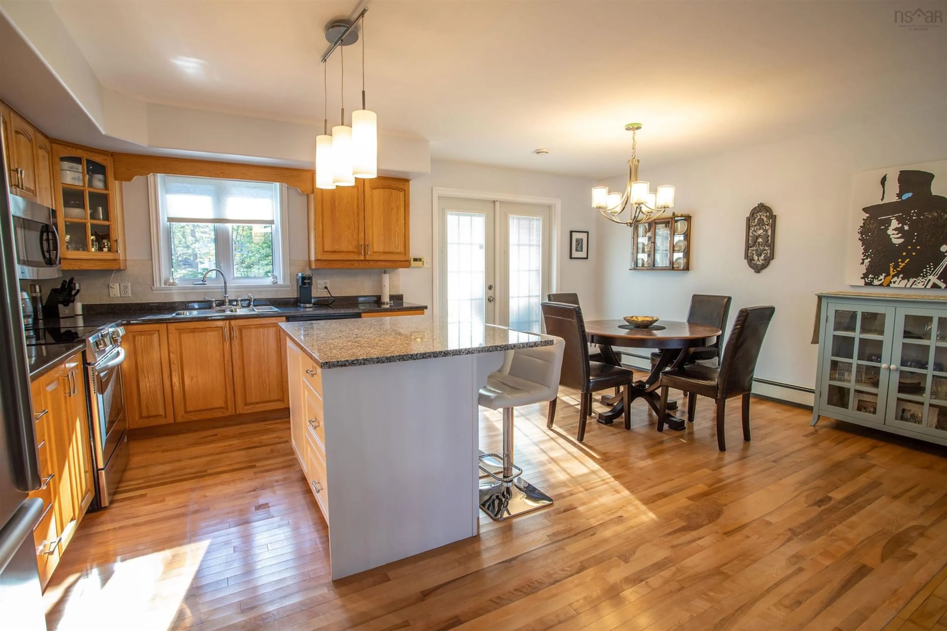 Open concept kitchen, wood/laminate floor for 311 Springfield Lake Road, Middle Sackville Nova Scotia B4E 3B1