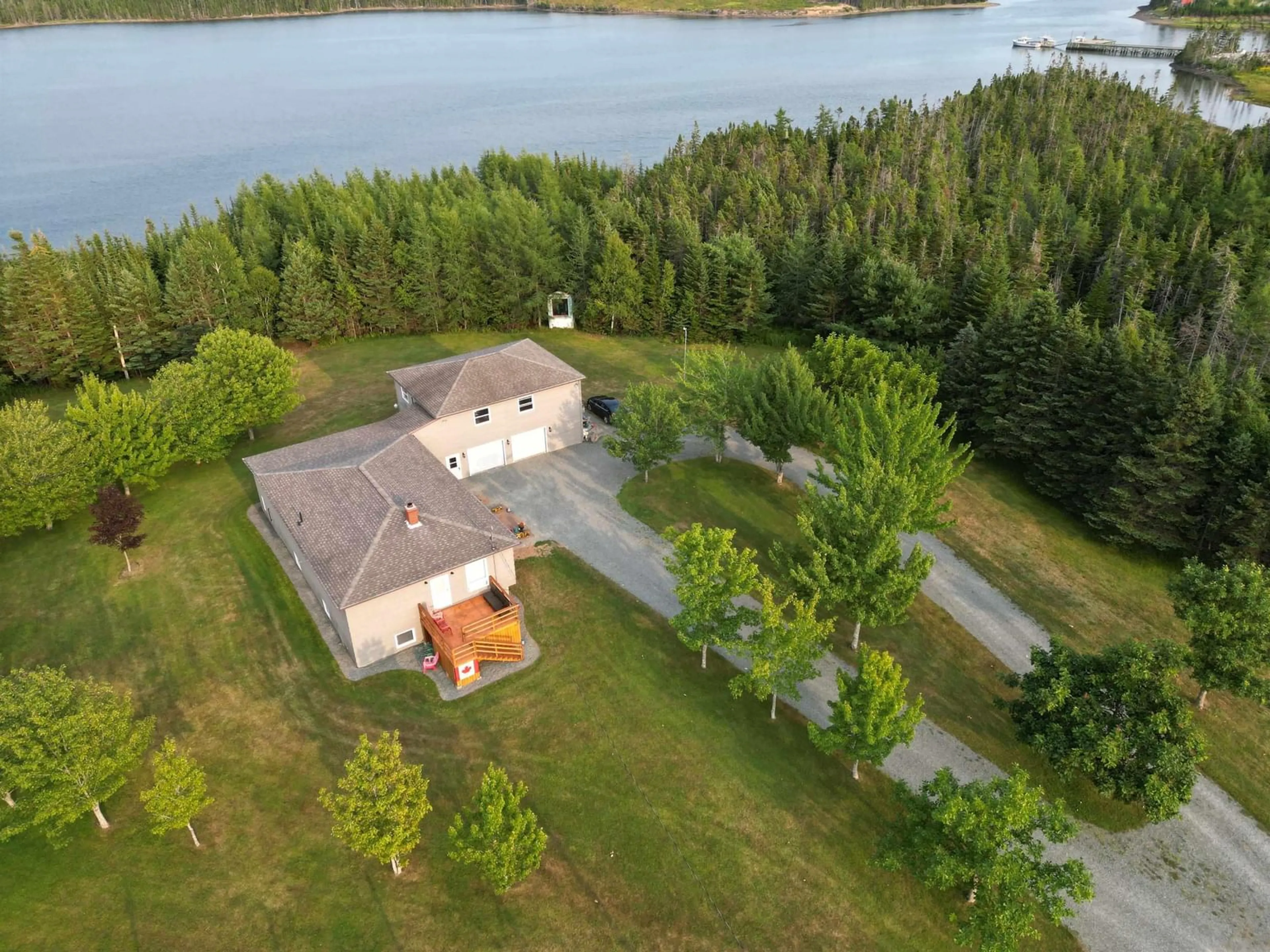 A pic from outside/outdoor area/front of a property/back of a property/a pic from drone, water/lake/river/ocean view for 9 Grand Gully Rd, River Tillard Nova Scotia B0E 2X0