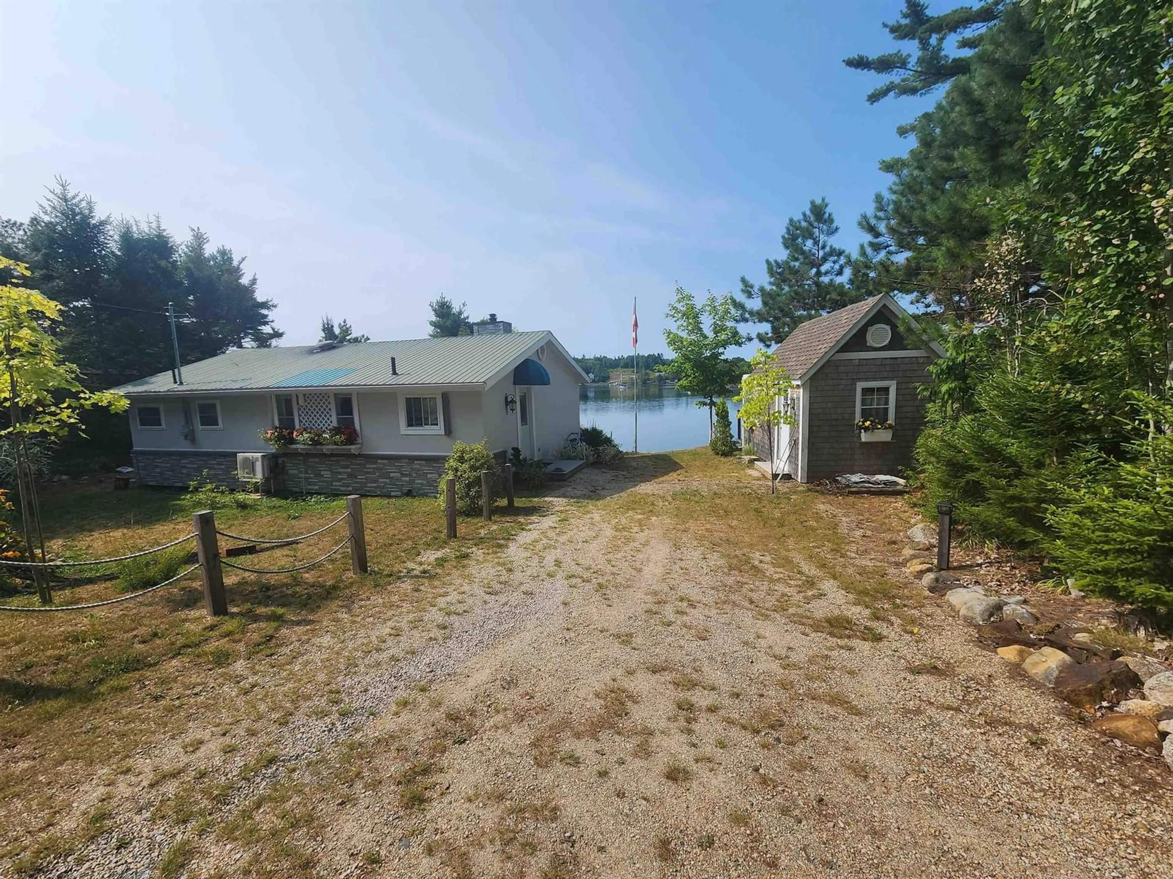 A pic from outside/outdoor area/front of a property/back of a property/a pic from drone, unknown for 96 Narrows Basin Road, Martins River Nova Scotia B0N 1T0