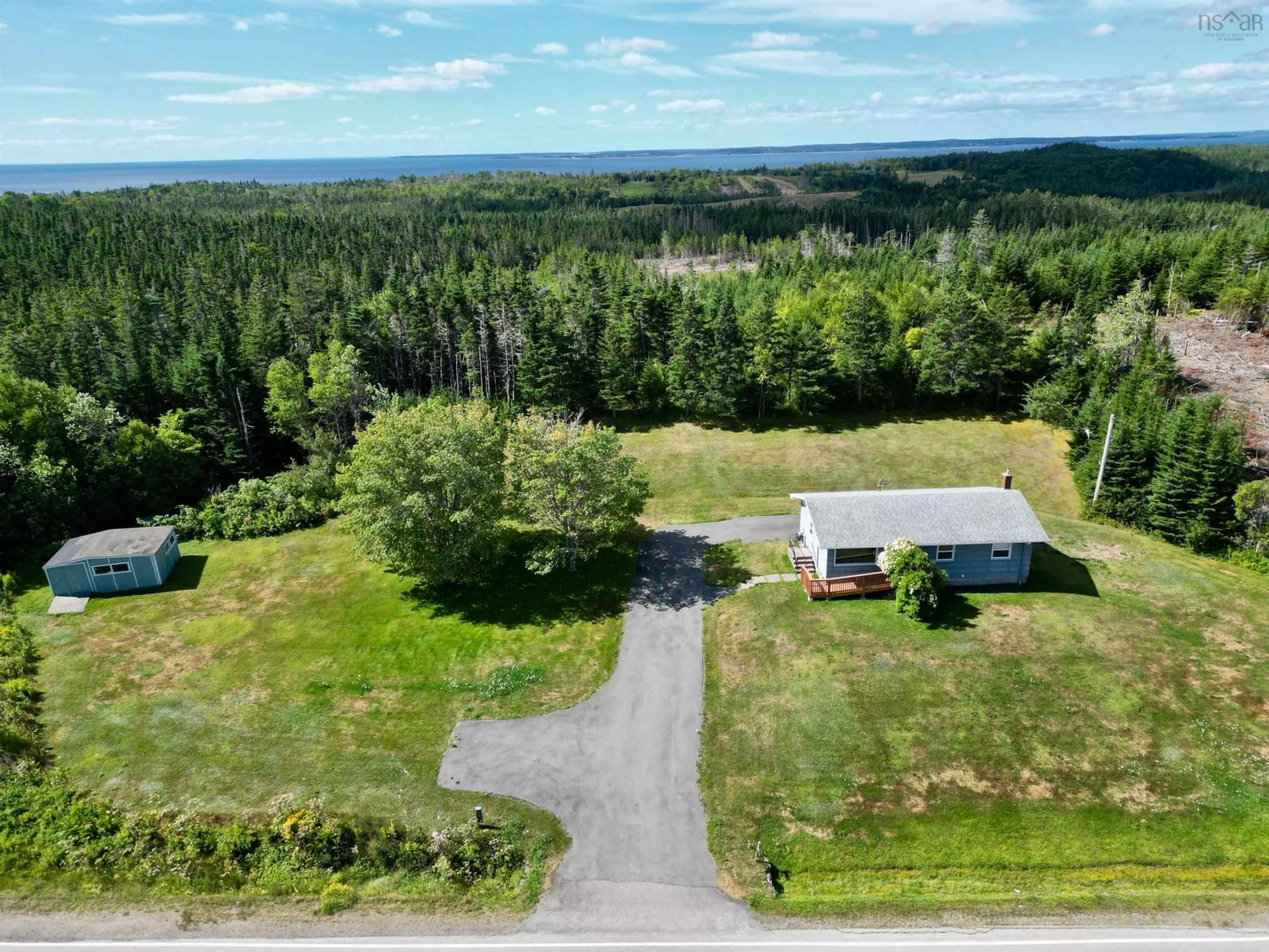 A pic from outside/outdoor area/front of a property/back of a property/a pic from drone, unknown for 594 Highway 247, Grand Greve Nova Scotia B0E 3B0