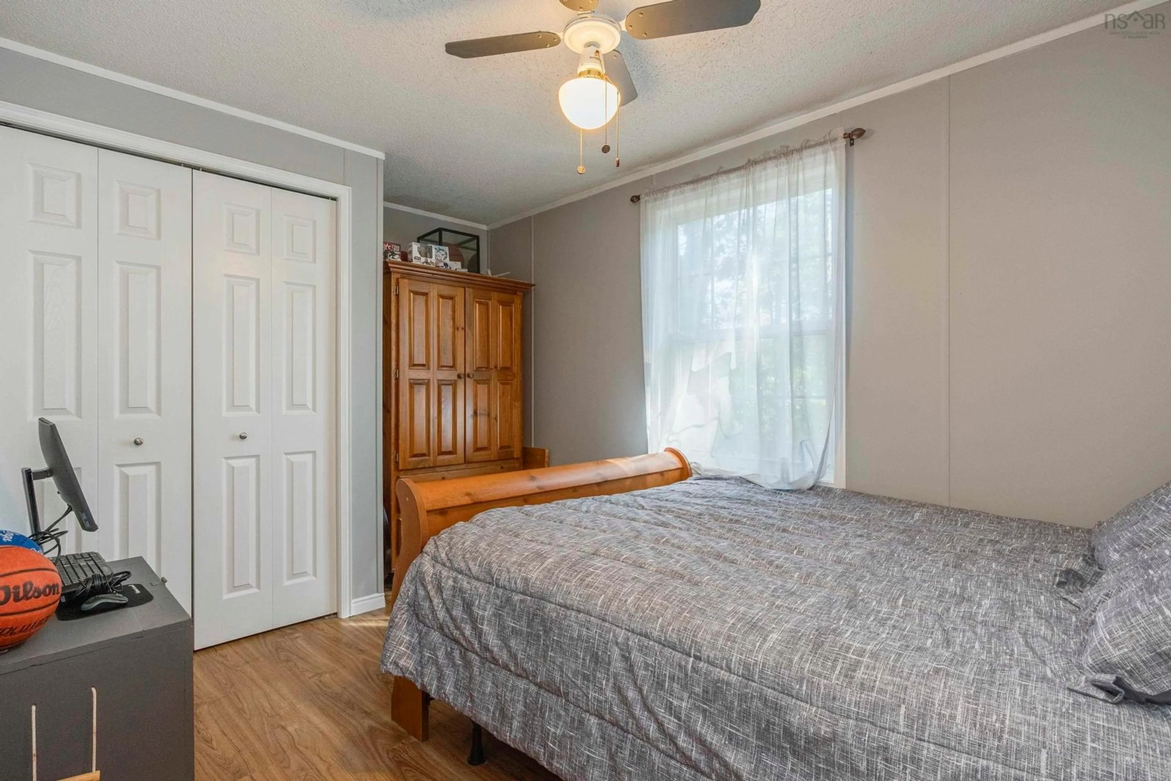 Bedroom with bed, wood/laminate floor for 4 Wicks Dr, Meadowvale Nova Scotia B0P 1R0