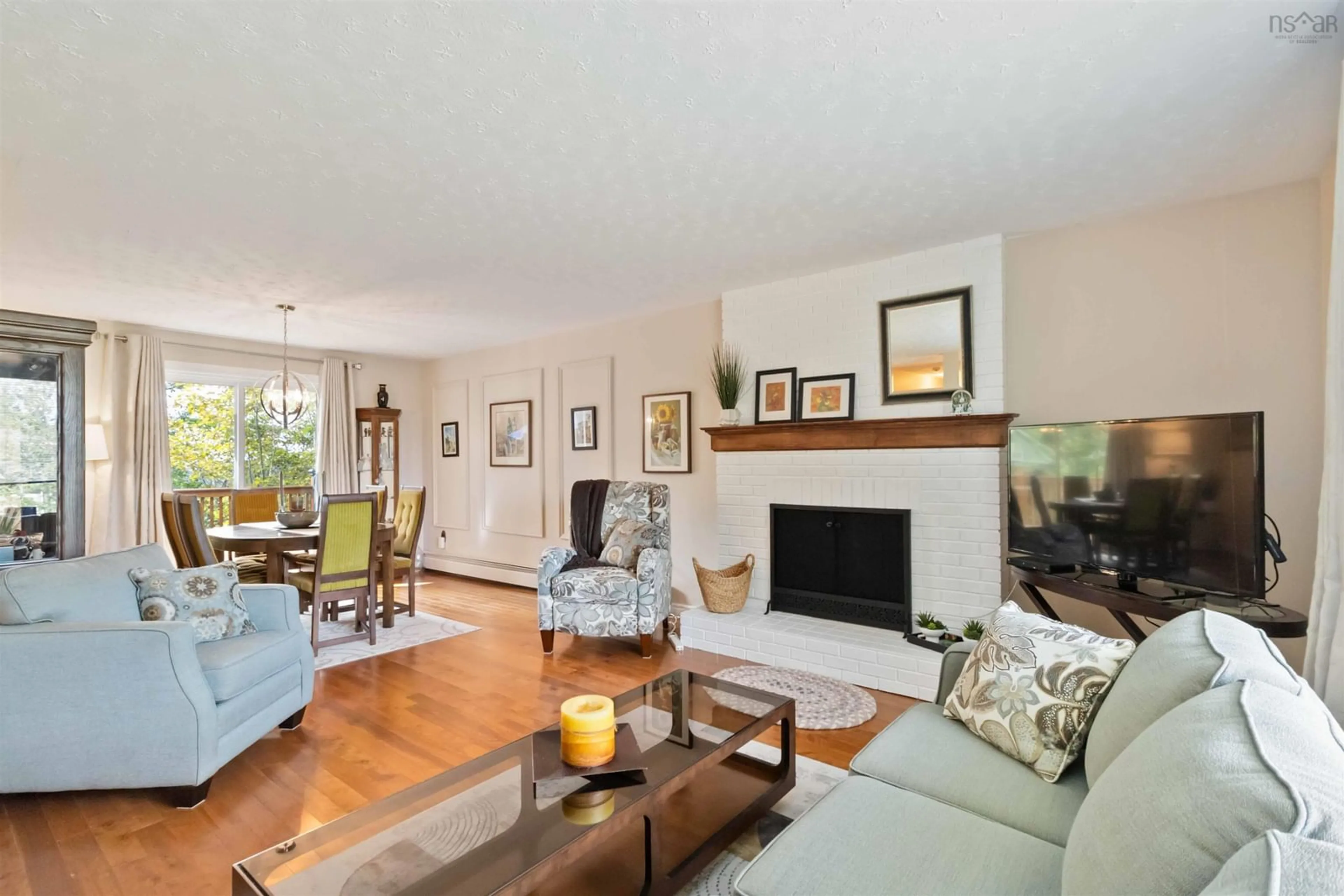 Living room with furniture, wood/laminate floor for 1 Patricia Pl, Lake Echo Nova Scotia B3E 1B1