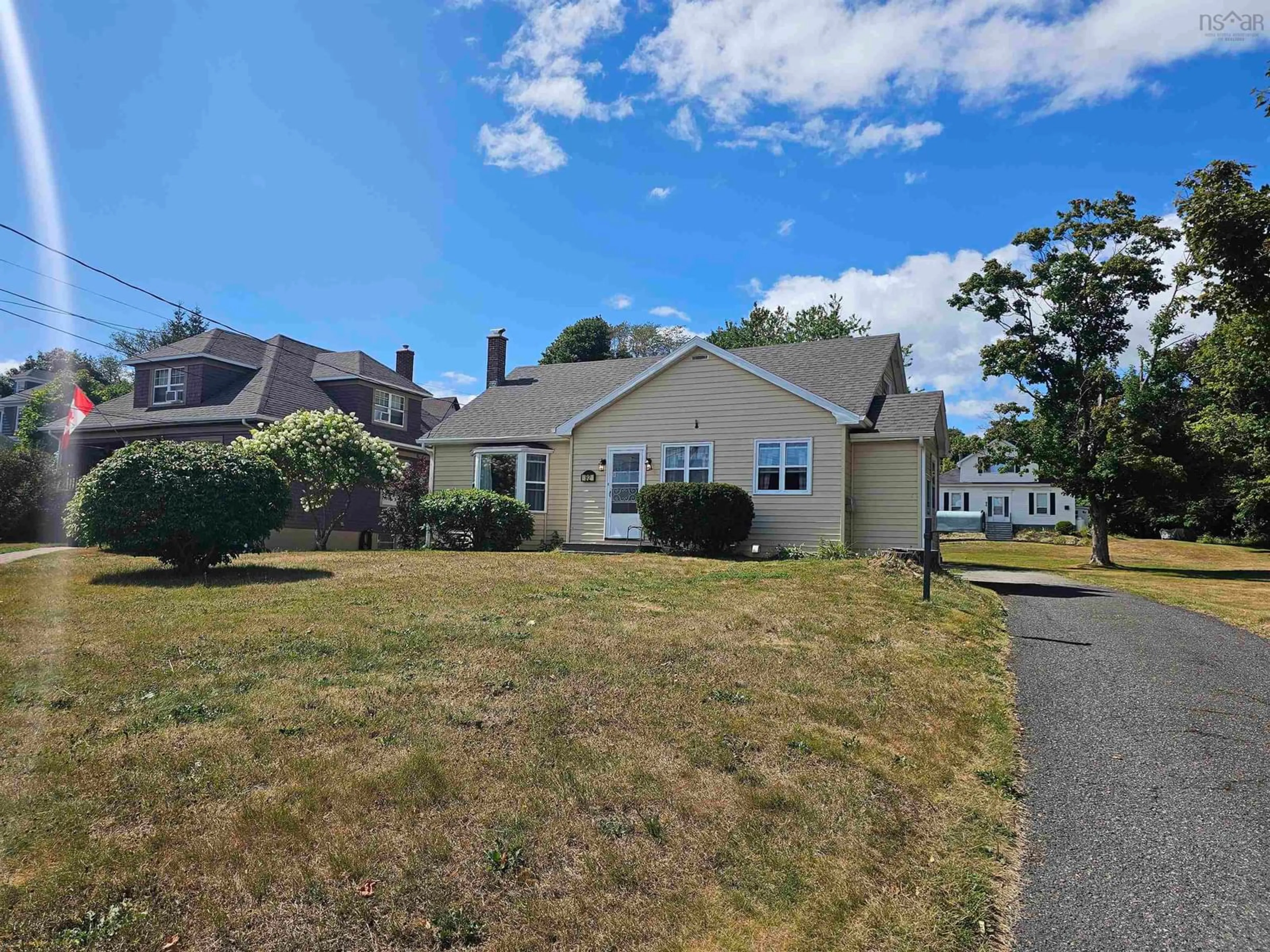 A pic from outside/outdoor area/front of a property/back of a property/a pic from drone, street for 92 Queen St, North Sydney Nova Scotia B2A 1A6