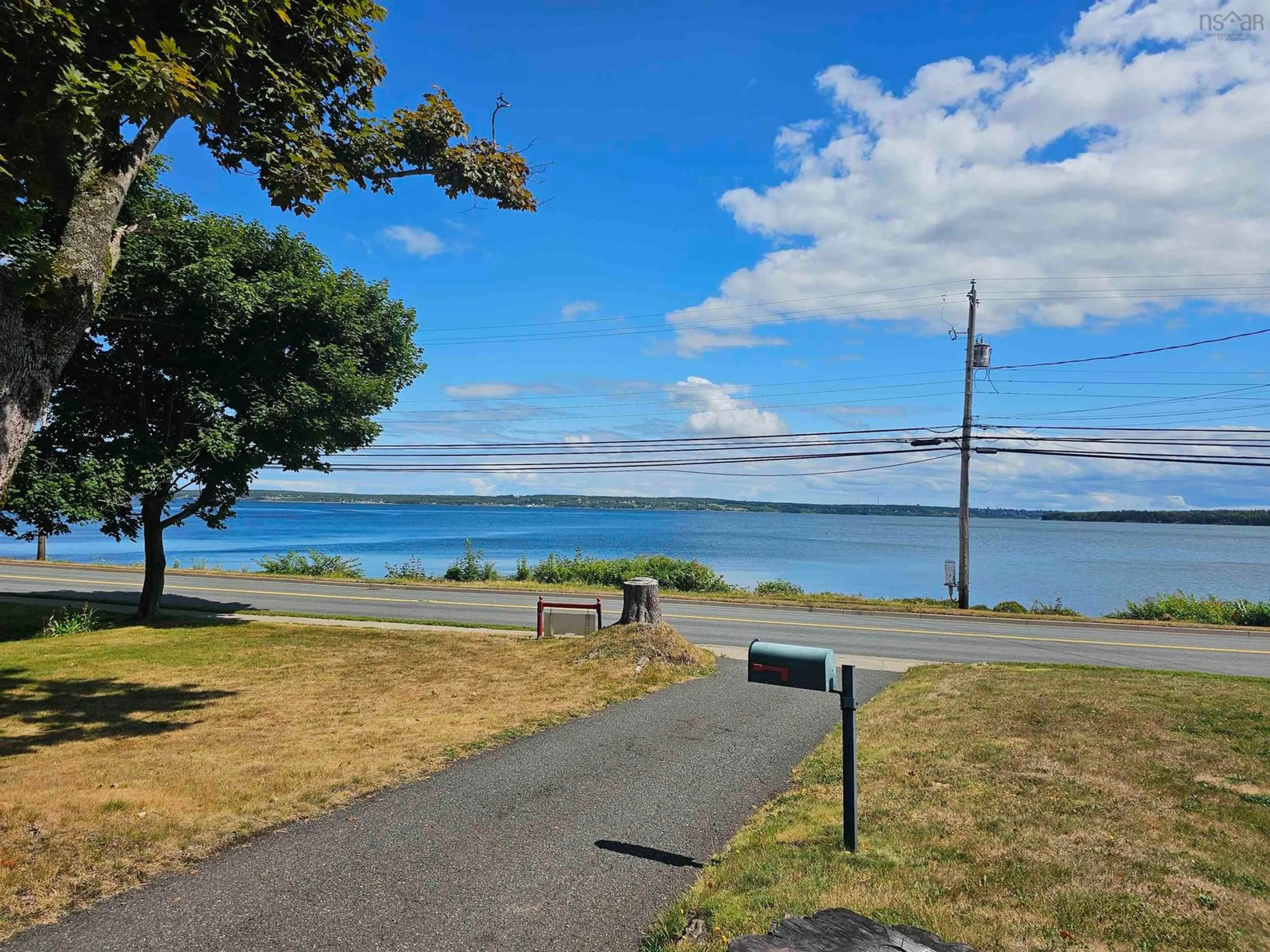 A pic from outside/outdoor area/front of a property/back of a property/a pic from drone, water/lake/river/ocean view for 92 Queen St, North Sydney Nova Scotia B2A 1A6