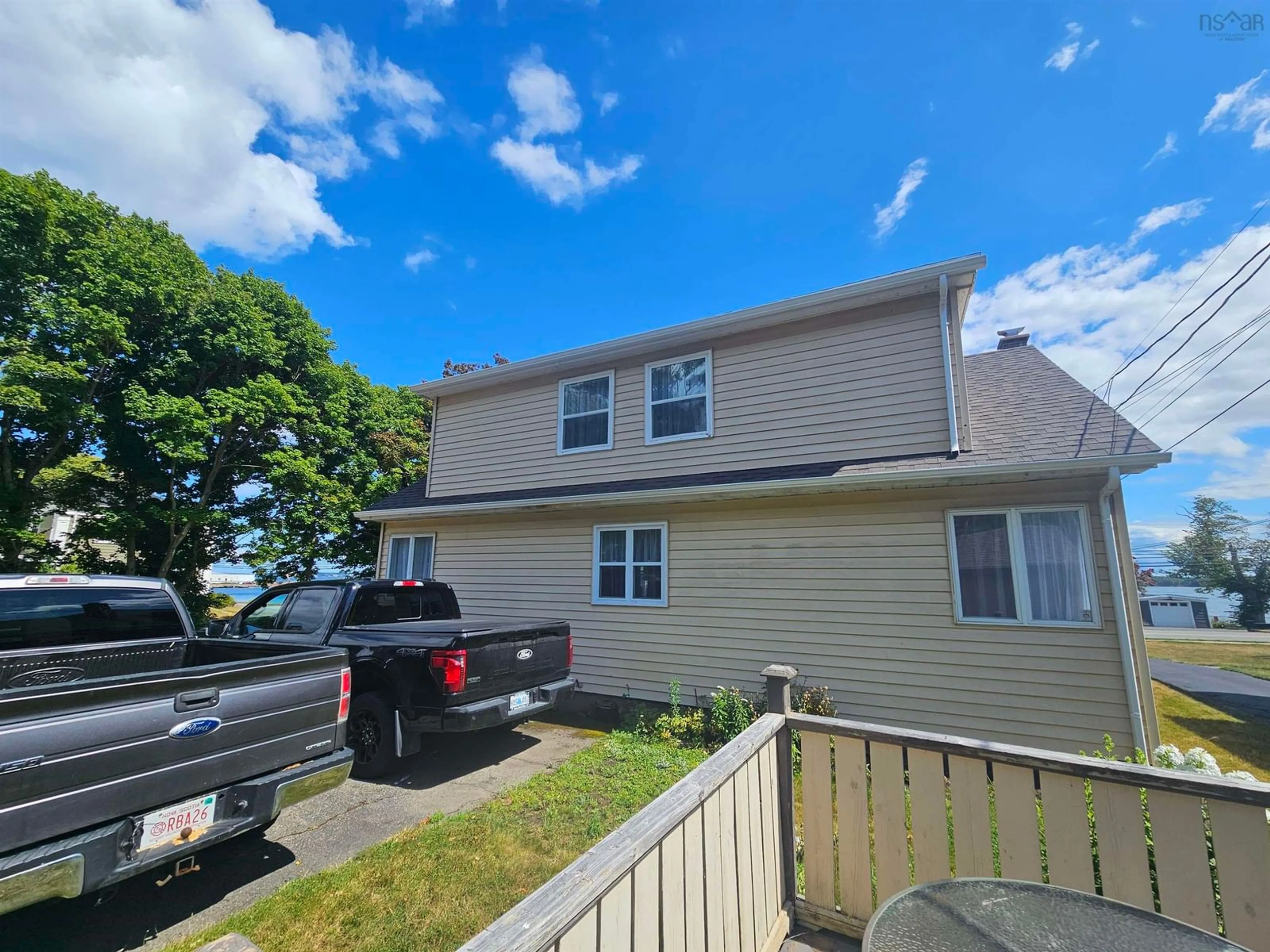 A pic from outside/outdoor area/front of a property/back of a property/a pic from drone, street for 92 Queen St, North Sydney Nova Scotia B2A 1A6