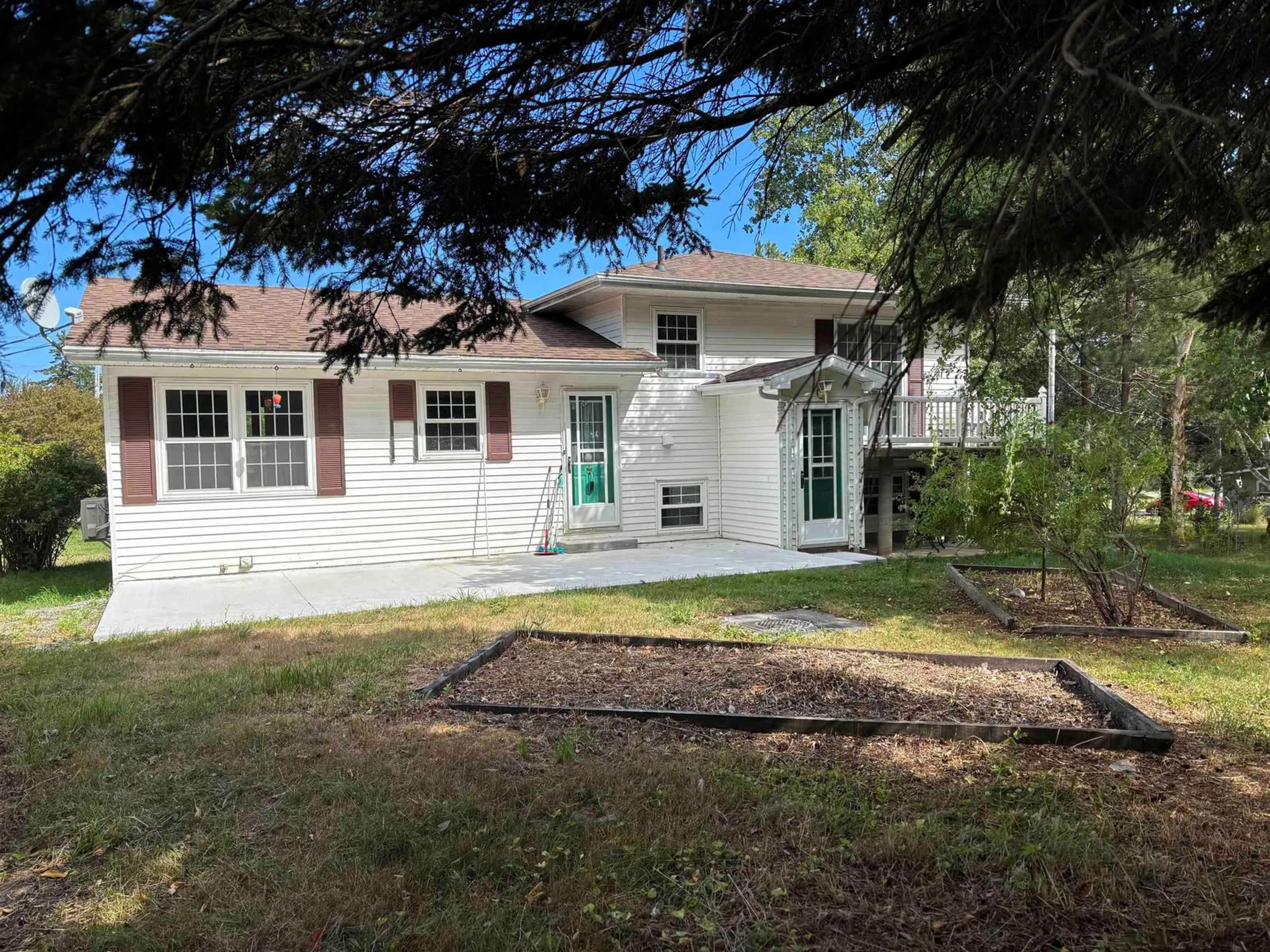 Home with vinyl exterior material, street for 1455 Keltic Dr., Leitches Creek Nova Scotia B2A 3X2