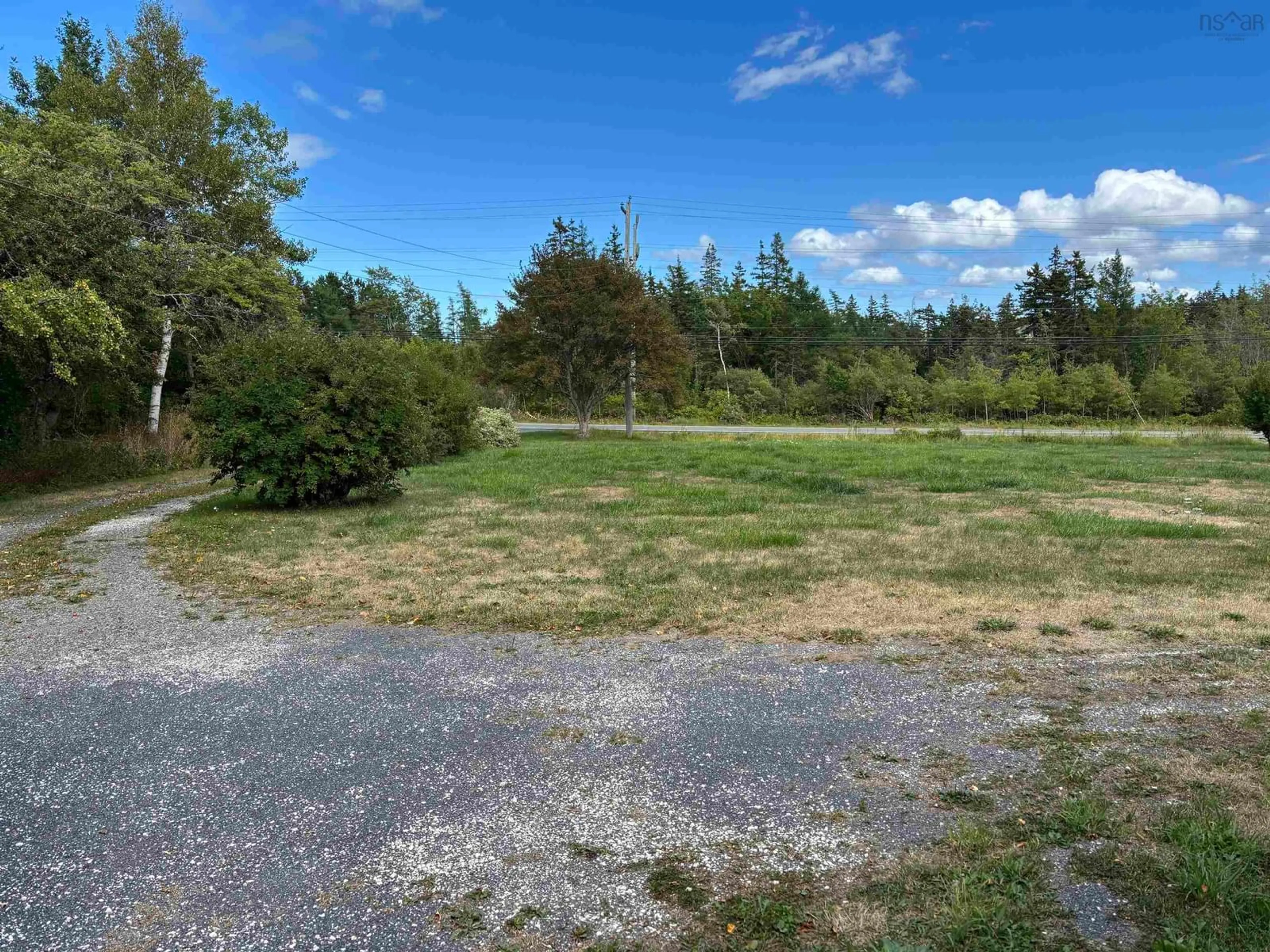A pic from outside/outdoor area/front of a property/back of a property/a pic from drone, forest/trees view for 1455 Keltic Dr., Leitches Creek Nova Scotia B2A 3X2