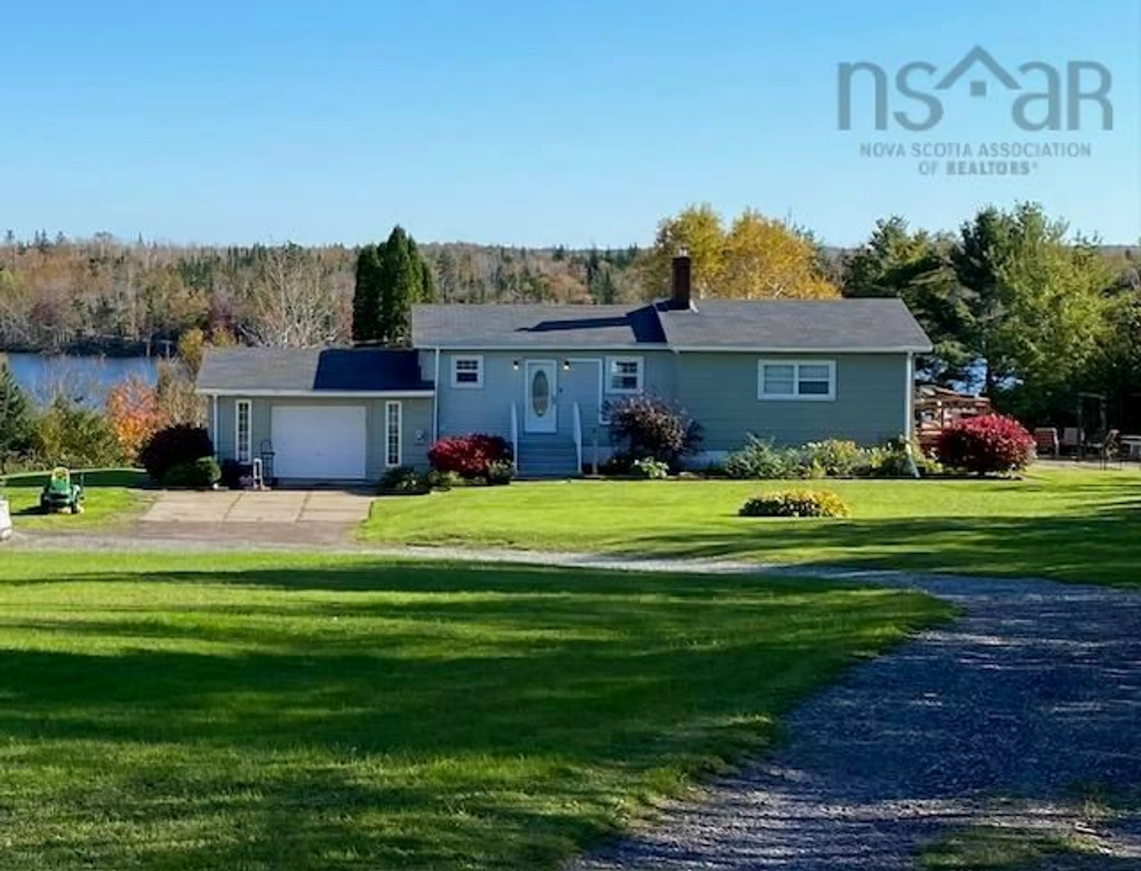 A pic from outside/outdoor area/front of a property/back of a property/a pic from drone, water/lake/river/ocean view for 5000 Louisbourg Hwy, Albert Bridge Nova Scotia B1K 3T9