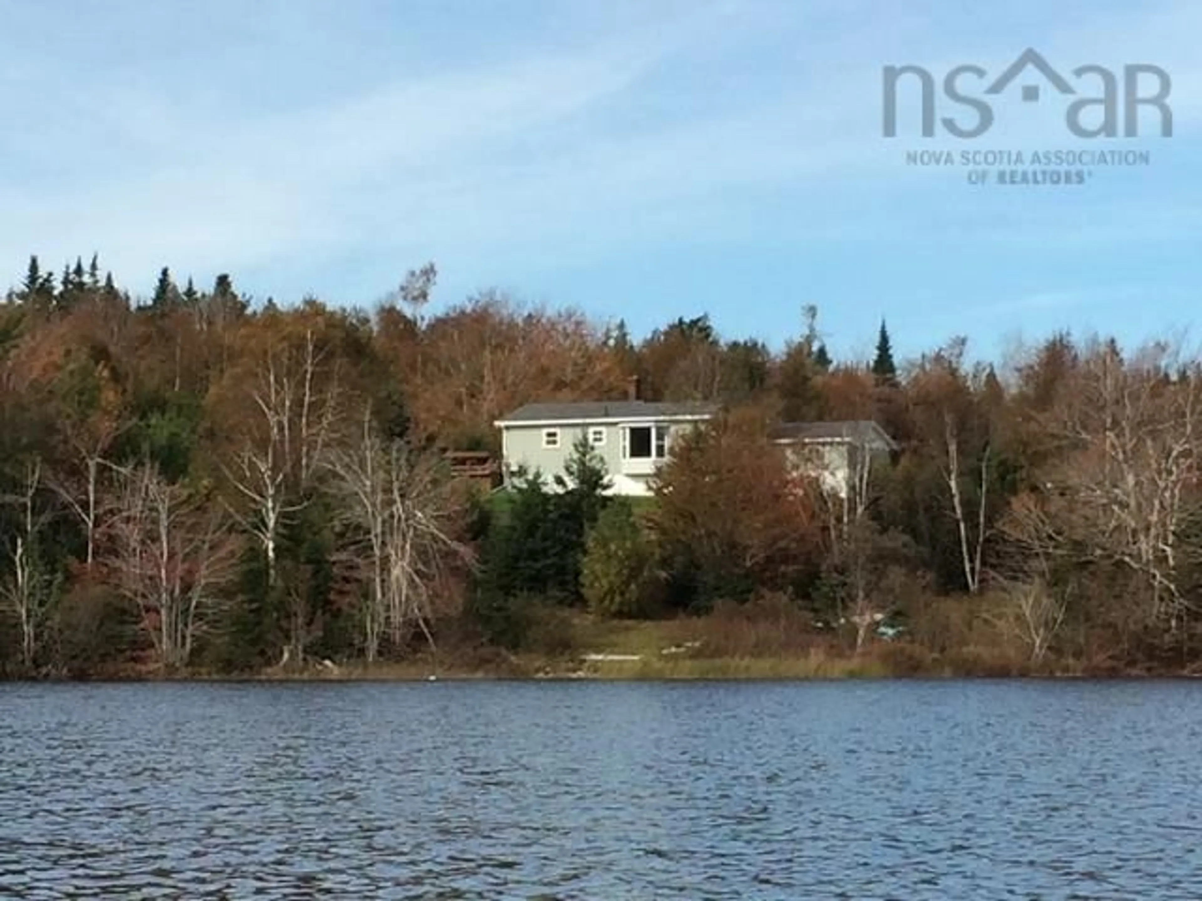 A pic from outside/outdoor area/front of a property/back of a property/a pic from drone, water/lake/river/ocean view for 5000 Louisbourg Hwy, Albert Bridge Nova Scotia B1K 3T9