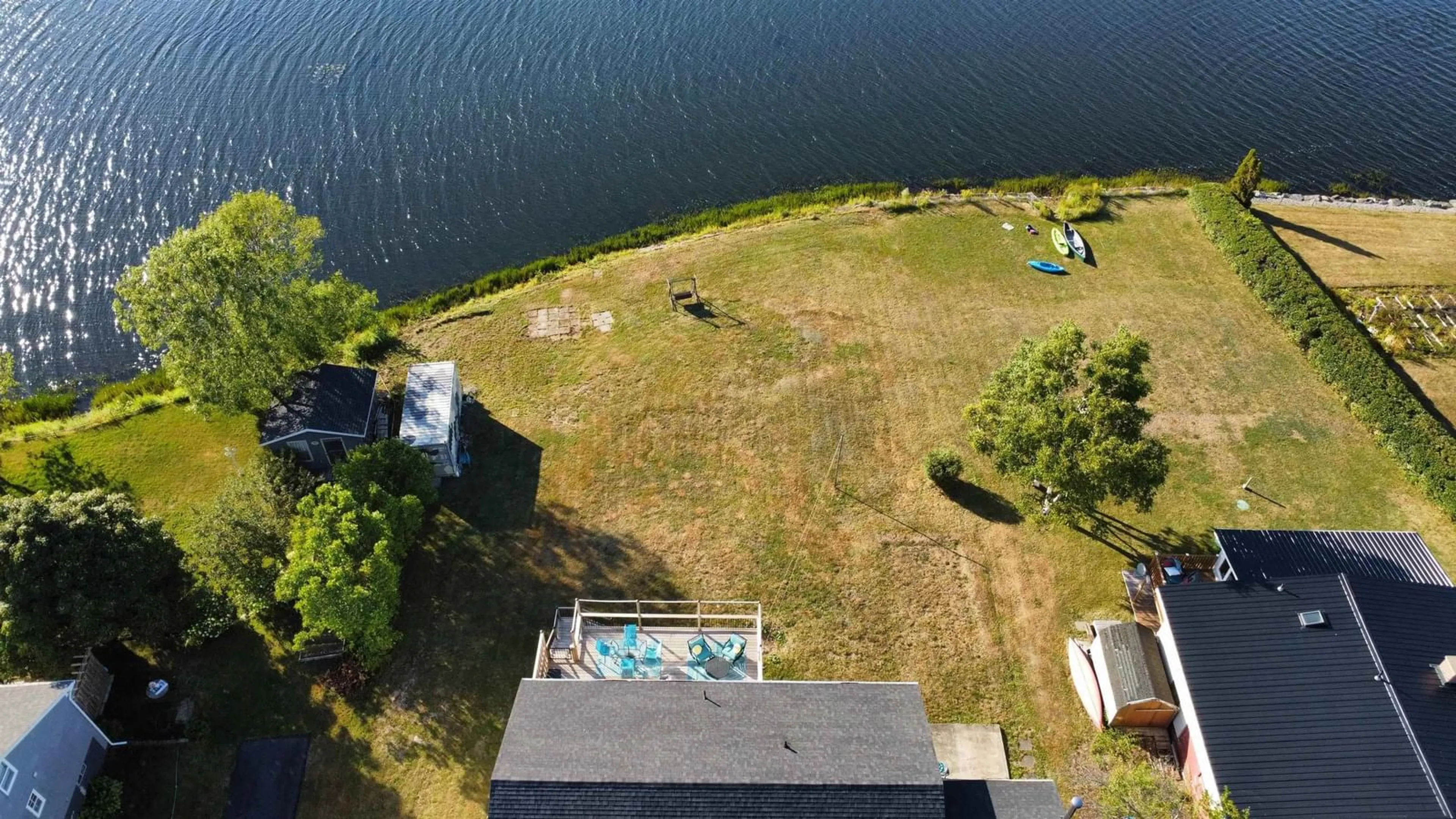 A pic from outside/outdoor area/front of a property/back of a property/a pic from drone, water/lake/river/ocean view for 2046 Kings Rd, Howie Centre Nova Scotia B1L 1C4