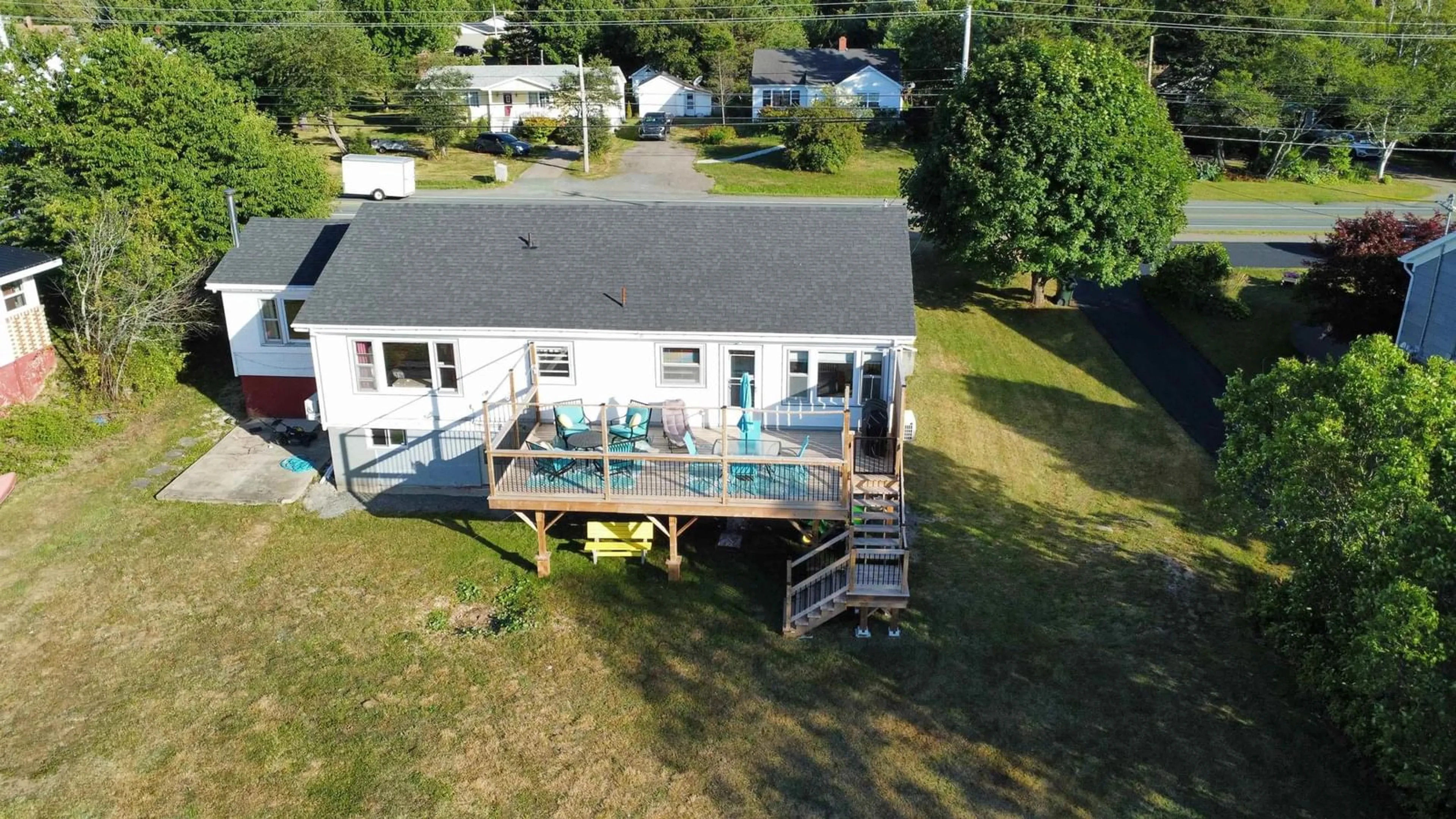A pic from outside/outdoor area/front of a property/back of a property/a pic from drone, water/lake/river/ocean view for 2046 Kings Rd, Howie Centre Nova Scotia B1L 1C4