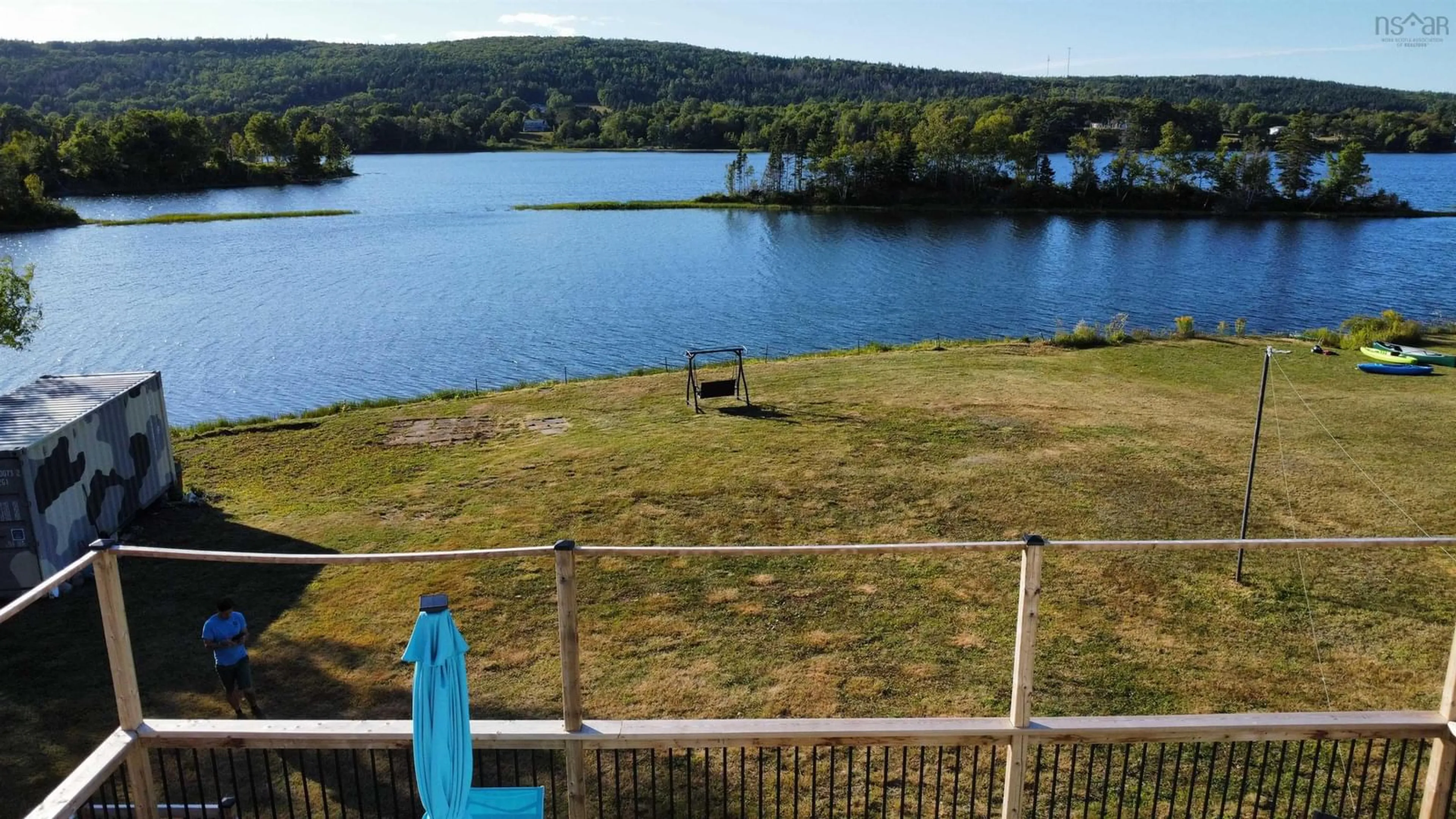 A pic from outside/outdoor area/front of a property/back of a property/a pic from drone, water/lake/river/ocean view for 2046 Kings Rd, Howie Centre Nova Scotia B1L 1C4