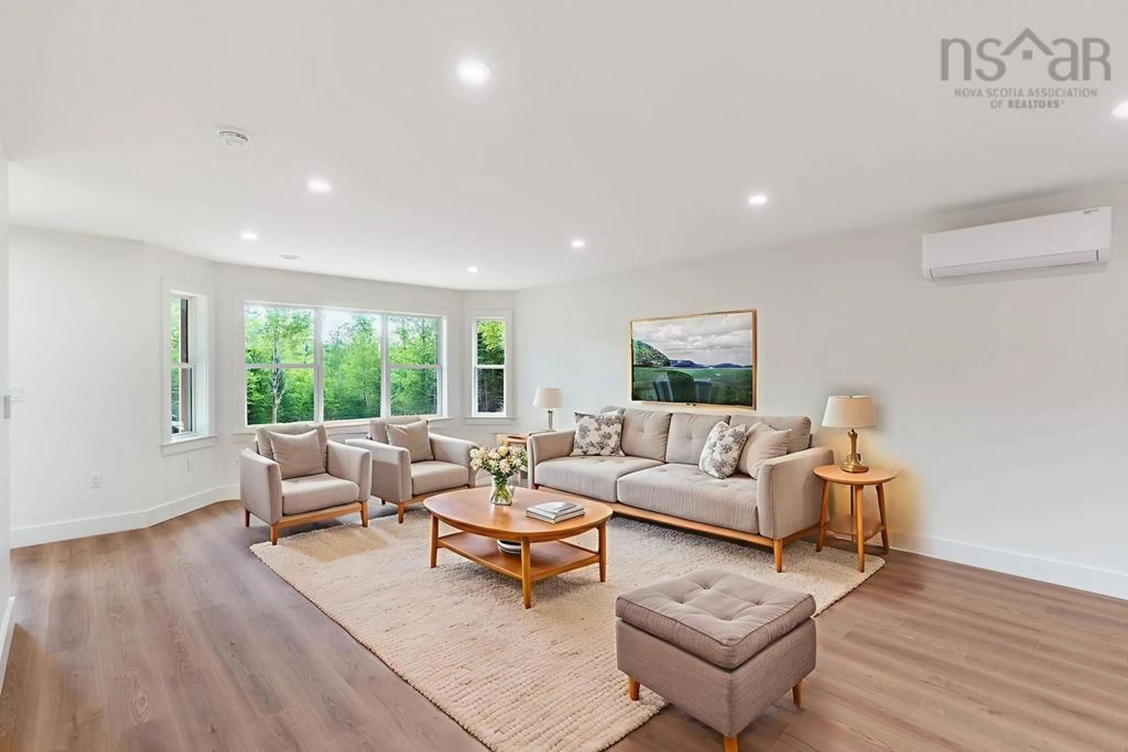 Living room with furniture, wood/laminate floor for 27 Periwinkle Dr, Enfield Nova Scotia B2T 0W8
