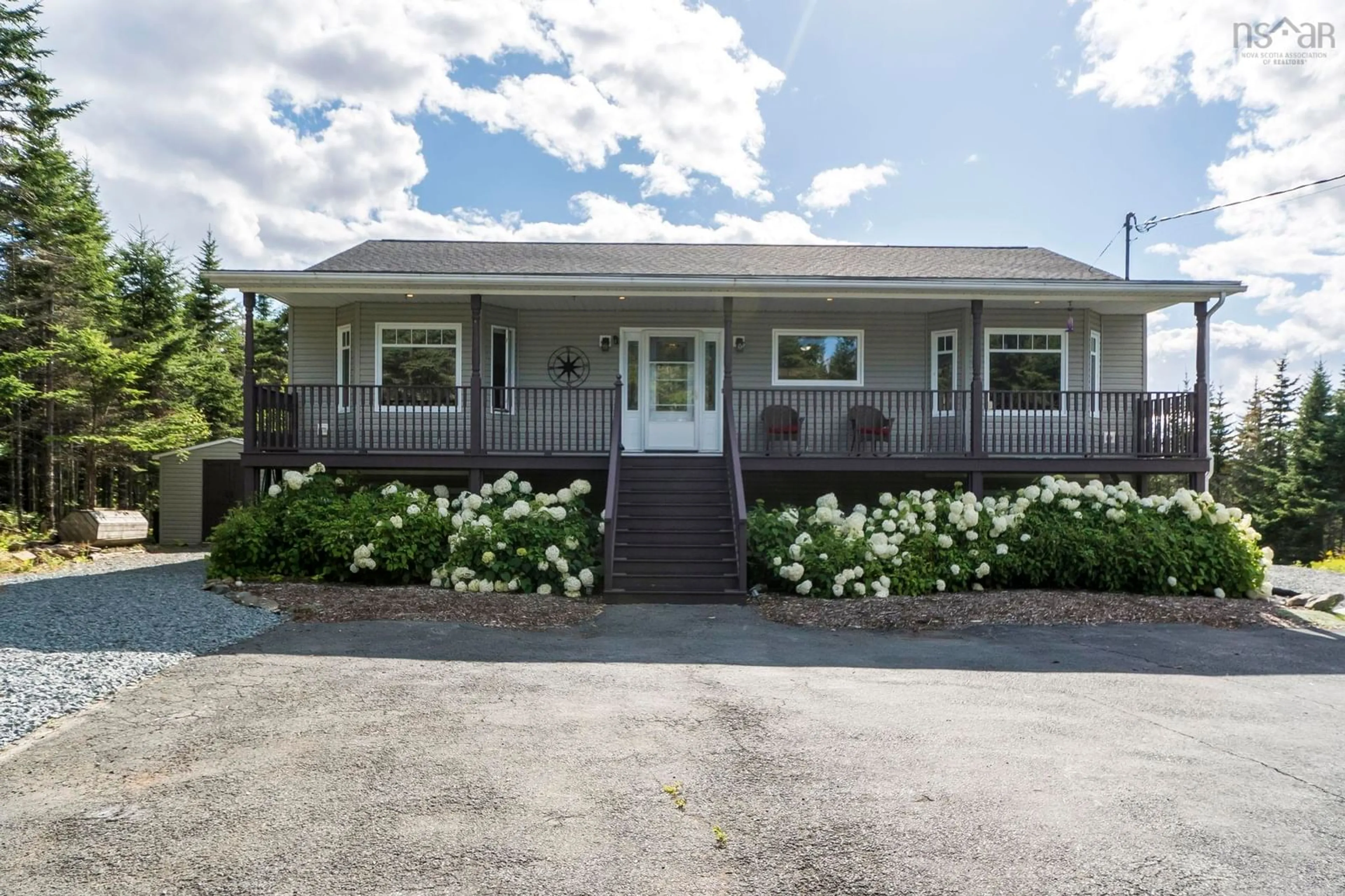 Home with vinyl exterior material, street for 284 Leslie Rd, East Lawrencetown Nova Scotia B2Z 1T4