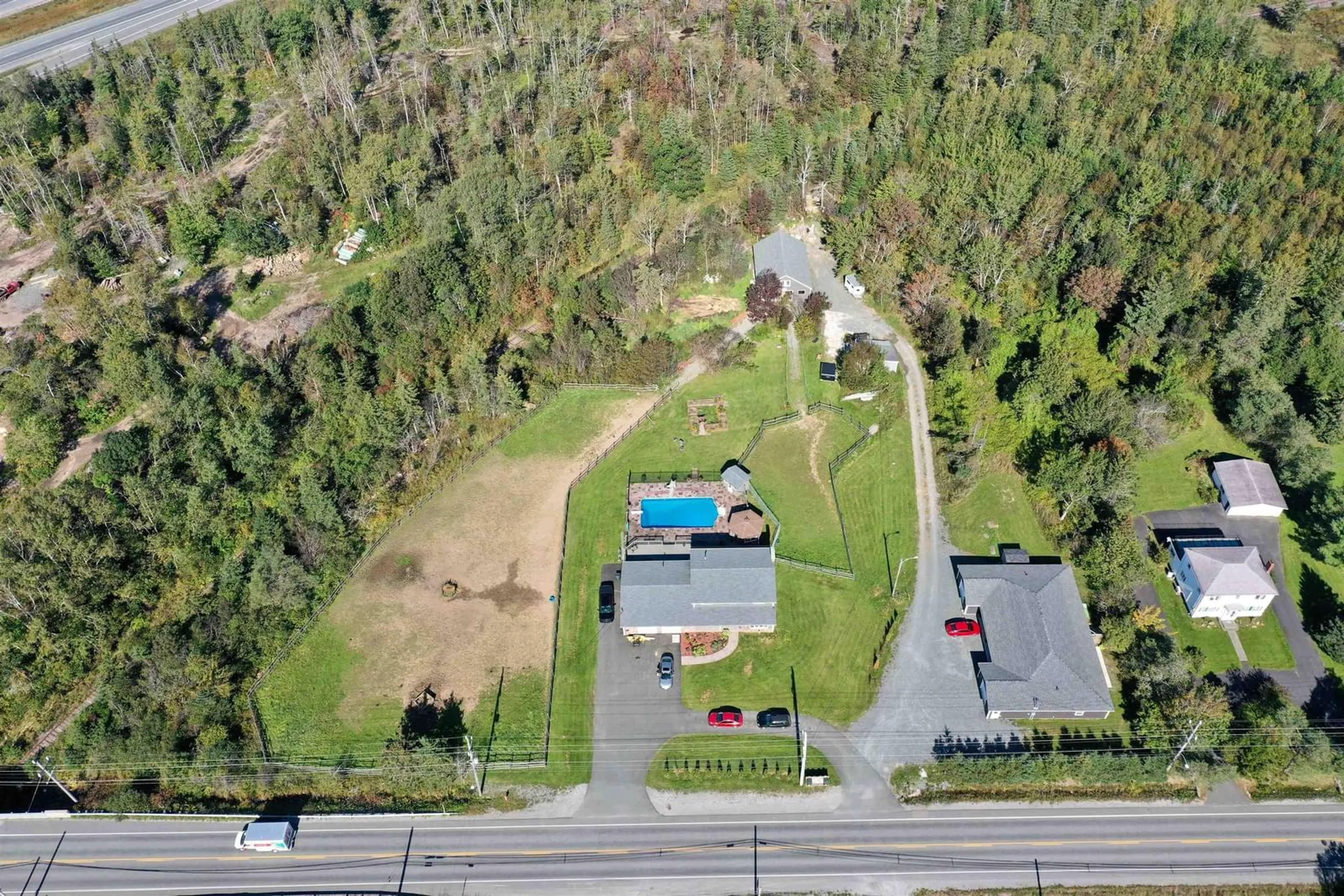A pic from outside/outdoor area/front of a property/back of a property/a pic from drone, street for 568 Seaview Dr, Upper North Sydney Nova Scotia B2A 3N8