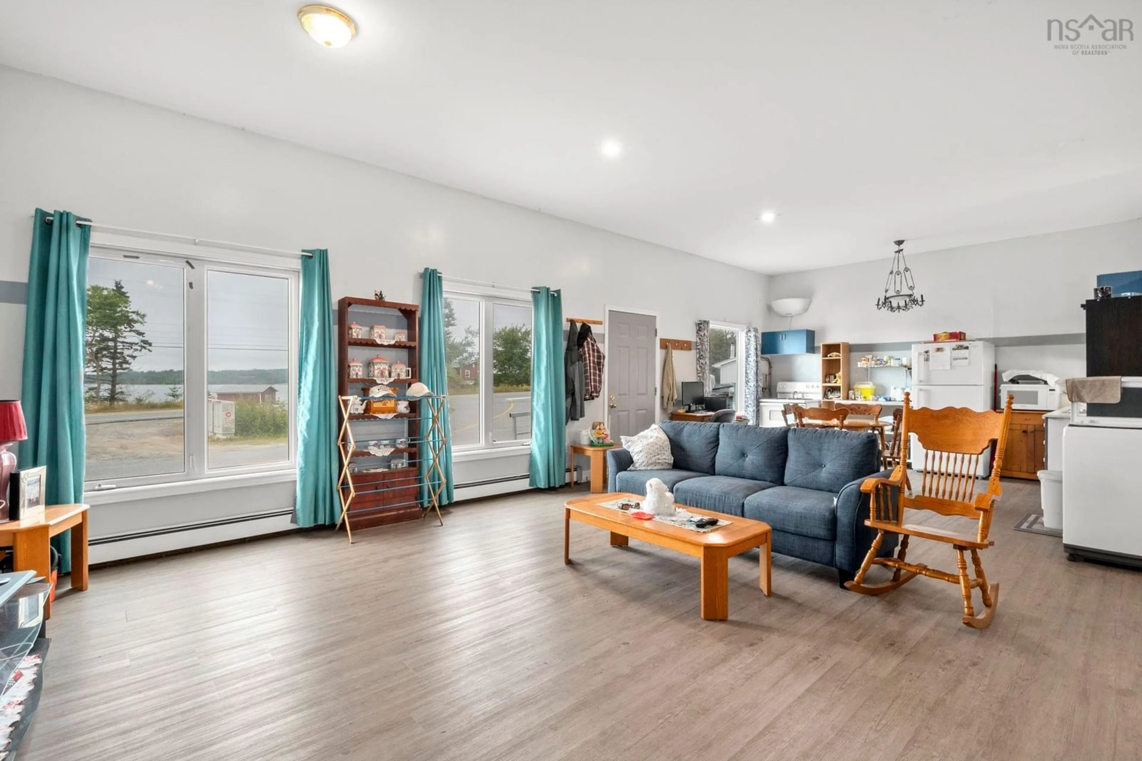 Living room with furniture, wood/laminate floor for 9 Harbourview Inn Loop, Salmon River Bridge Nova Scotia B0J 1P0