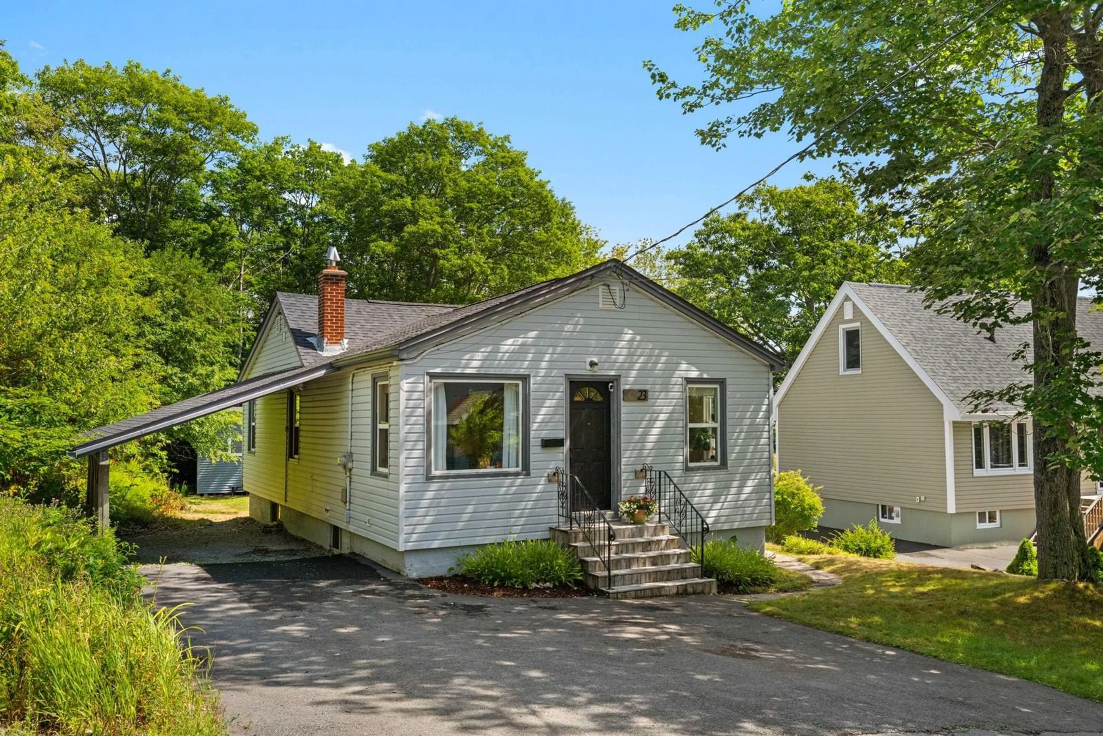 Home with vinyl exterior material, street for 23 Barrens St, Bedford Nova Scotia B4A 1Y6