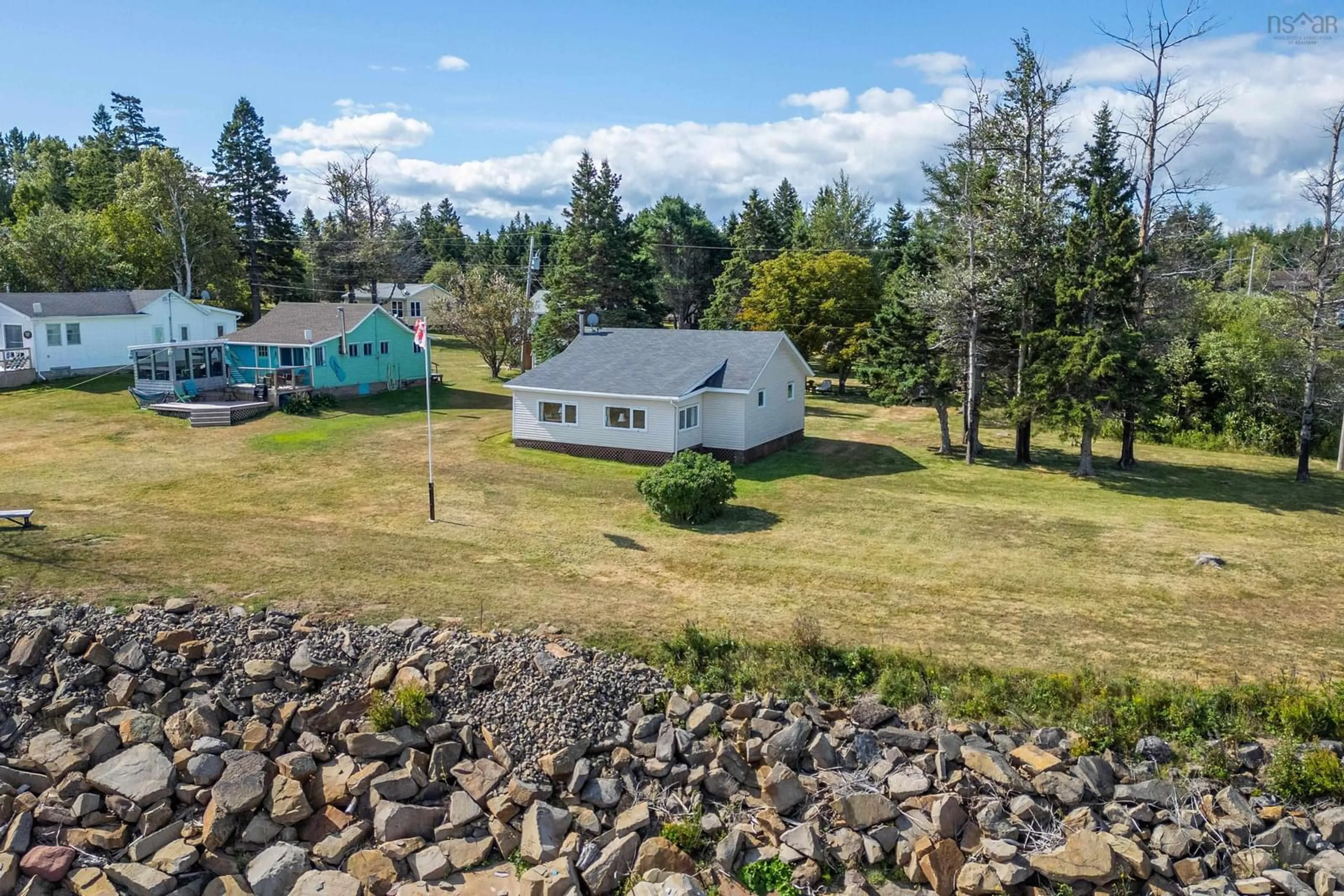 A pic from outside/outdoor area/front of a property/back of a property/a pic from drone, water/lake/river/ocean view for 3 Maccan Lane, Tidnish Cross Roads Nova Scotia B4H 3X9