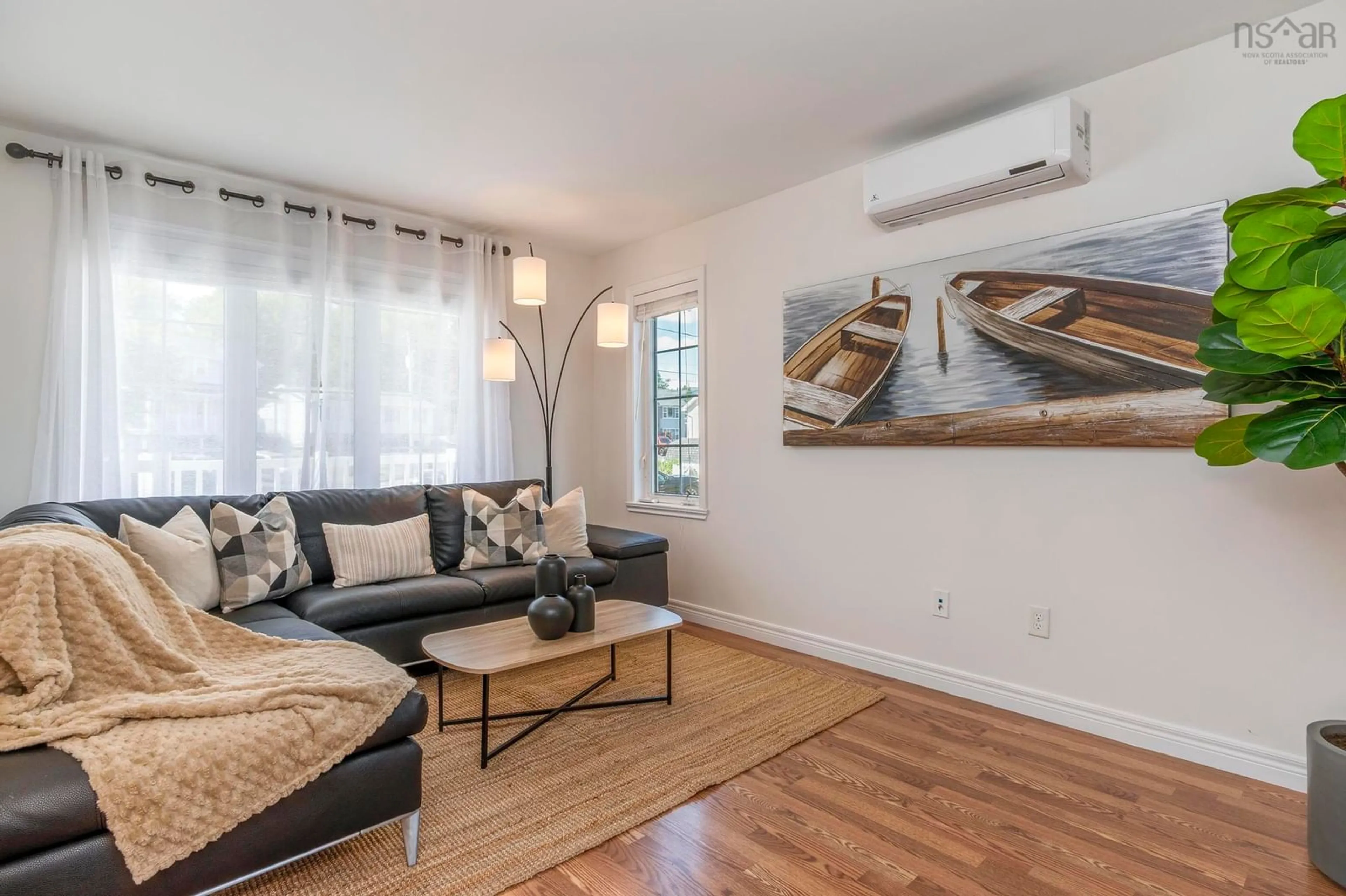Living room with furniture, wood/laminate floor for 32 Darrell Crt, Timberlea Nova Scotia B3T 1N8